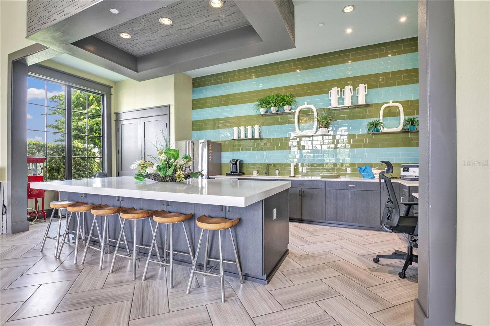 15749 CUTTER SAIL PLACE, Winter Garden, FL 34787 Elegant community clubhouse featuring impressive architectural details and inviting gathering spaces.
