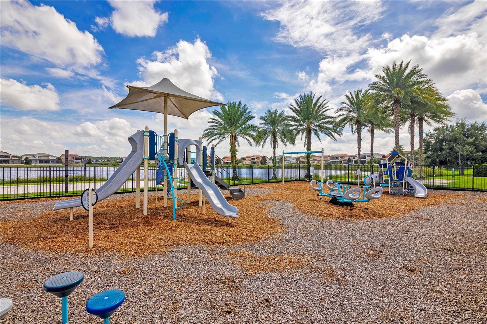 15749 CUTTER SAIL PLACE, Winter Garden, FL 34787 Community playground offering outdoor recreation in a beautifully maintained setting.