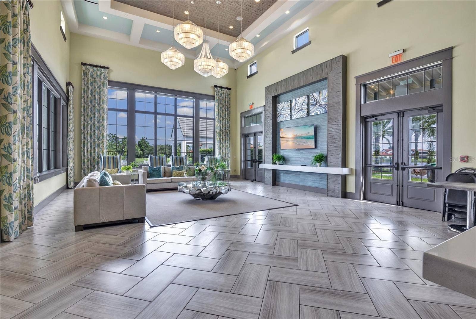 15749 CUTTER SAIL PLACE, Winter Garden, FL 34787 Elegant community clubhouse featuring impressive architectural details and inviting gathering spaces.