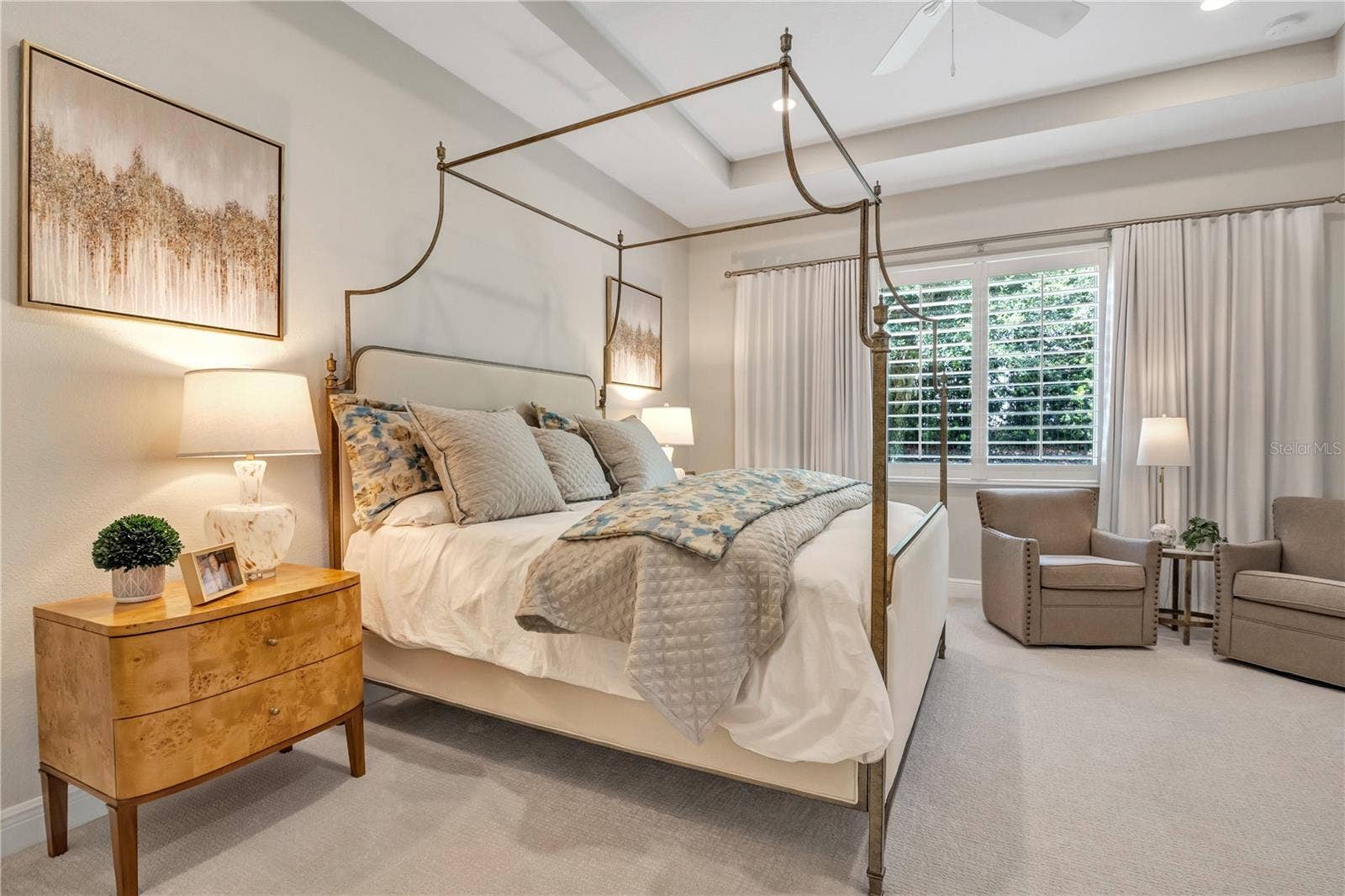 15749 CUTTER SAIL PLACE, Winter Garden, FL 34787 Spacious primary retreat offering comfort, elegance, and relaxation.