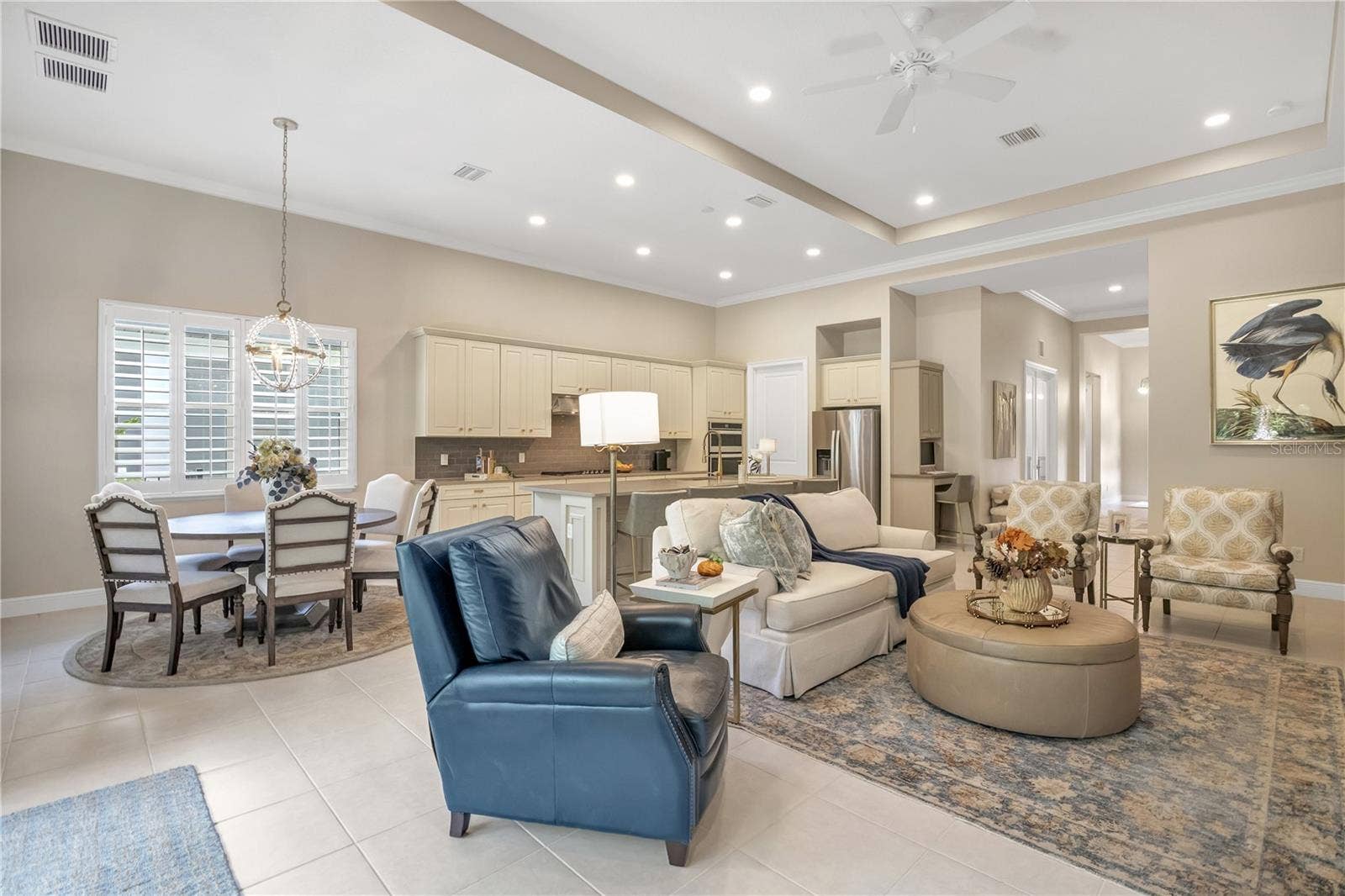 15749 CUTTER SAIL PLACE, Winter Garden, FL 34787 Spacious living area filled with natural light, perfect for relaxing or entertaining.
