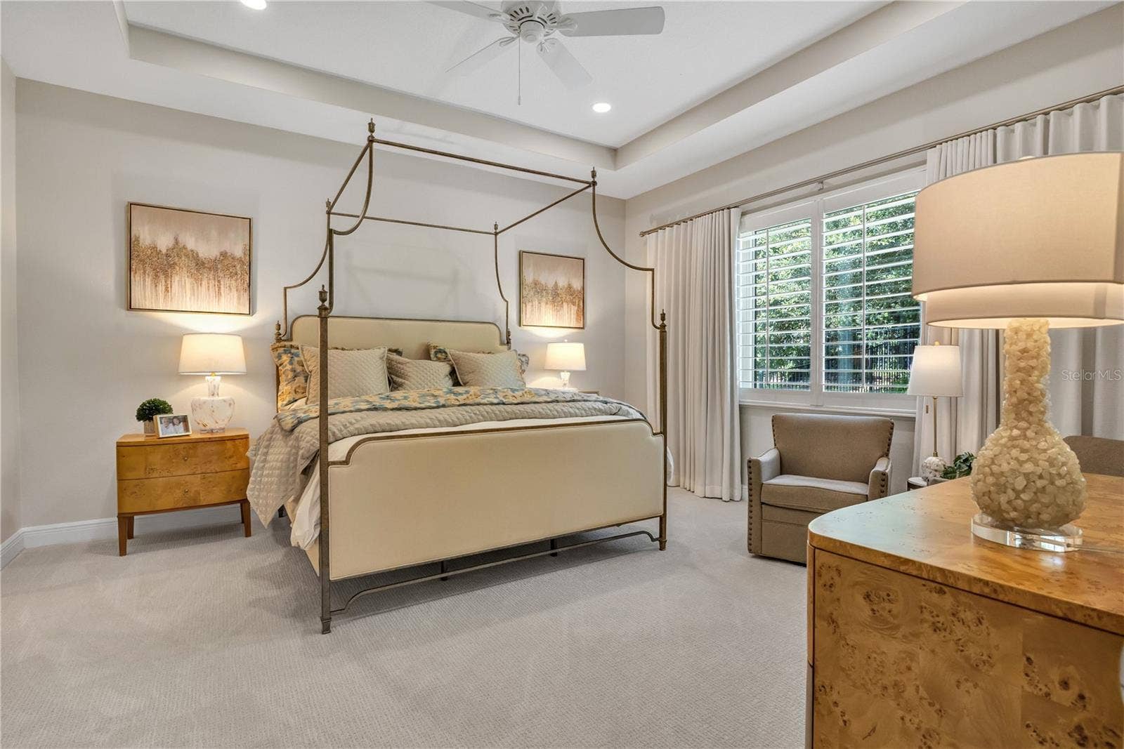 15749 CUTTER SAIL PLACE, Winter Garden, FL 34787 Elegant primary suite offering a peaceful retreat with sophisticated finishes.