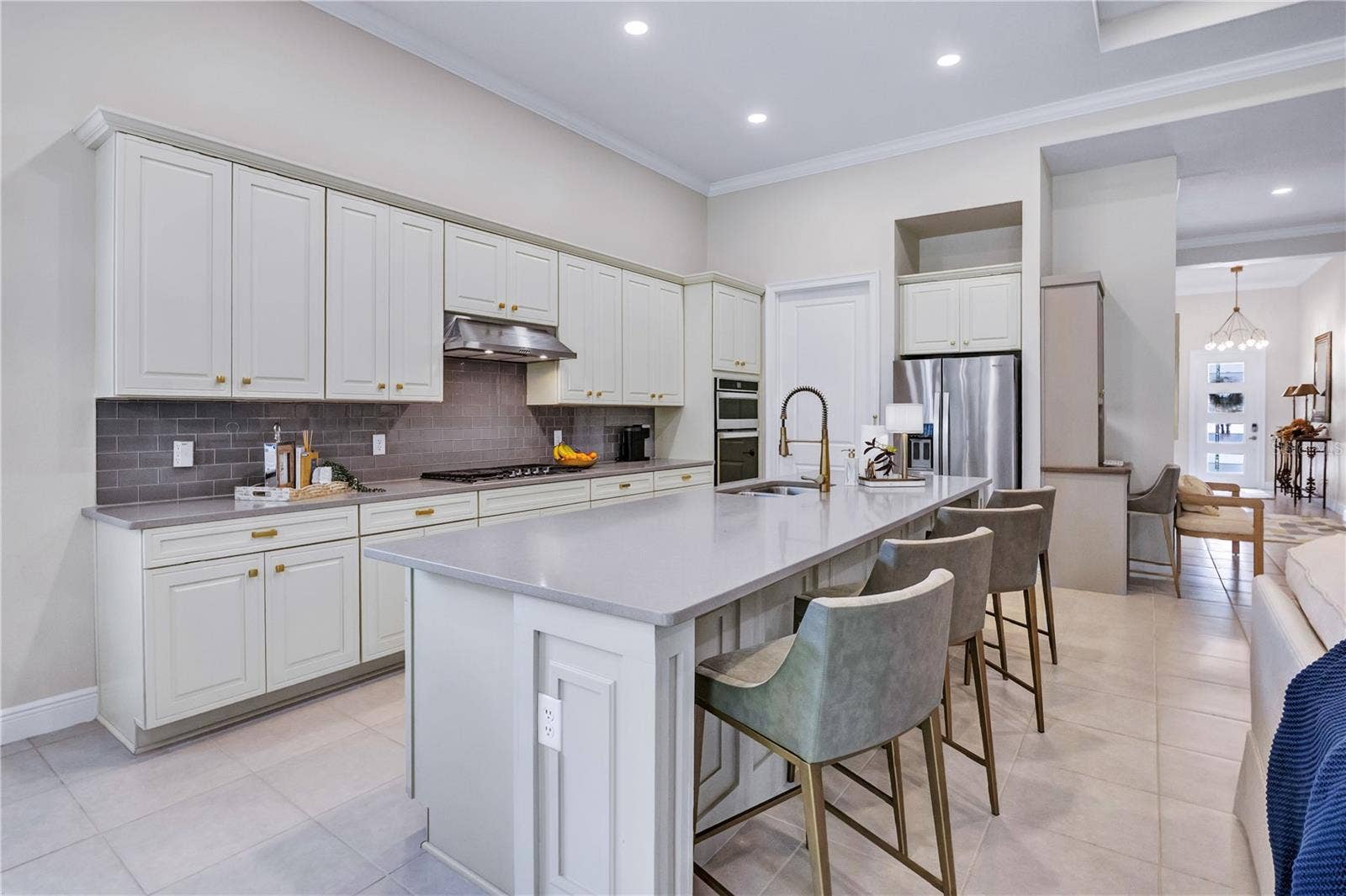 15749 CUTTER SAIL PLACE, Winter Garden, FL 34787 Beautifully appointed kitchen featuring generous counter space and stylish finishes.
