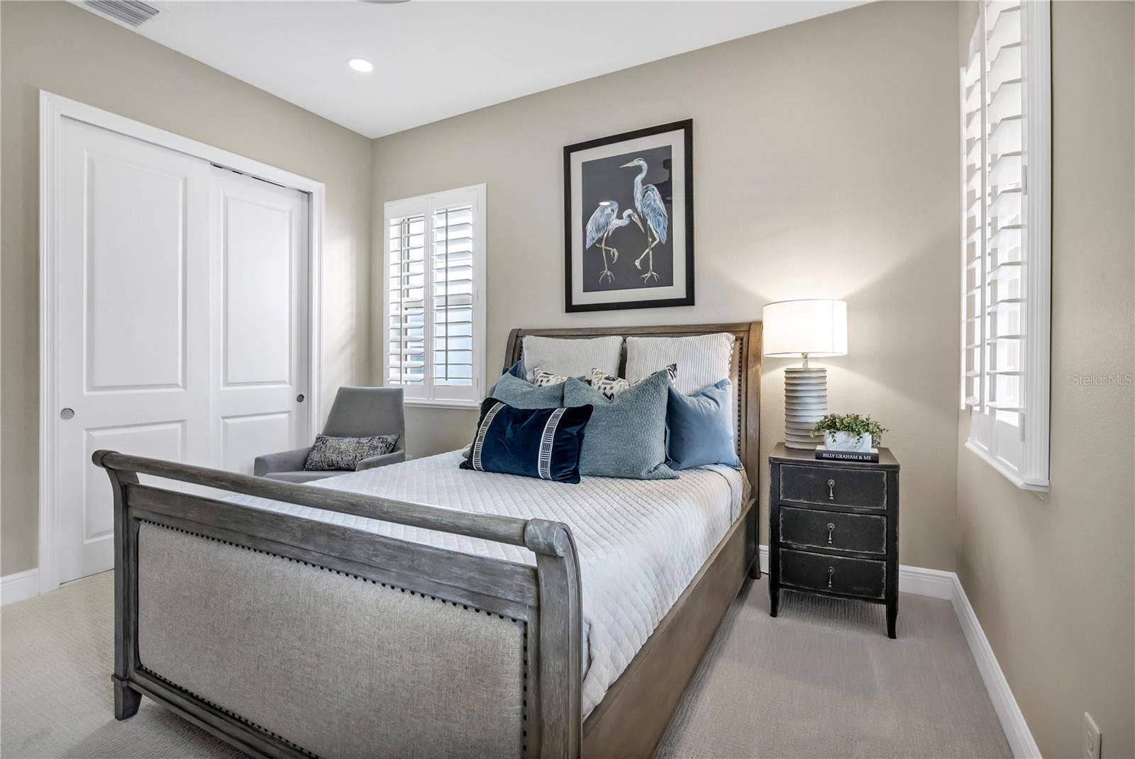 15749 CUTTER SAIL PLACE, Winter Garden, FL 34787 Additional view showcasing the bedroom's generous layout and closet space.