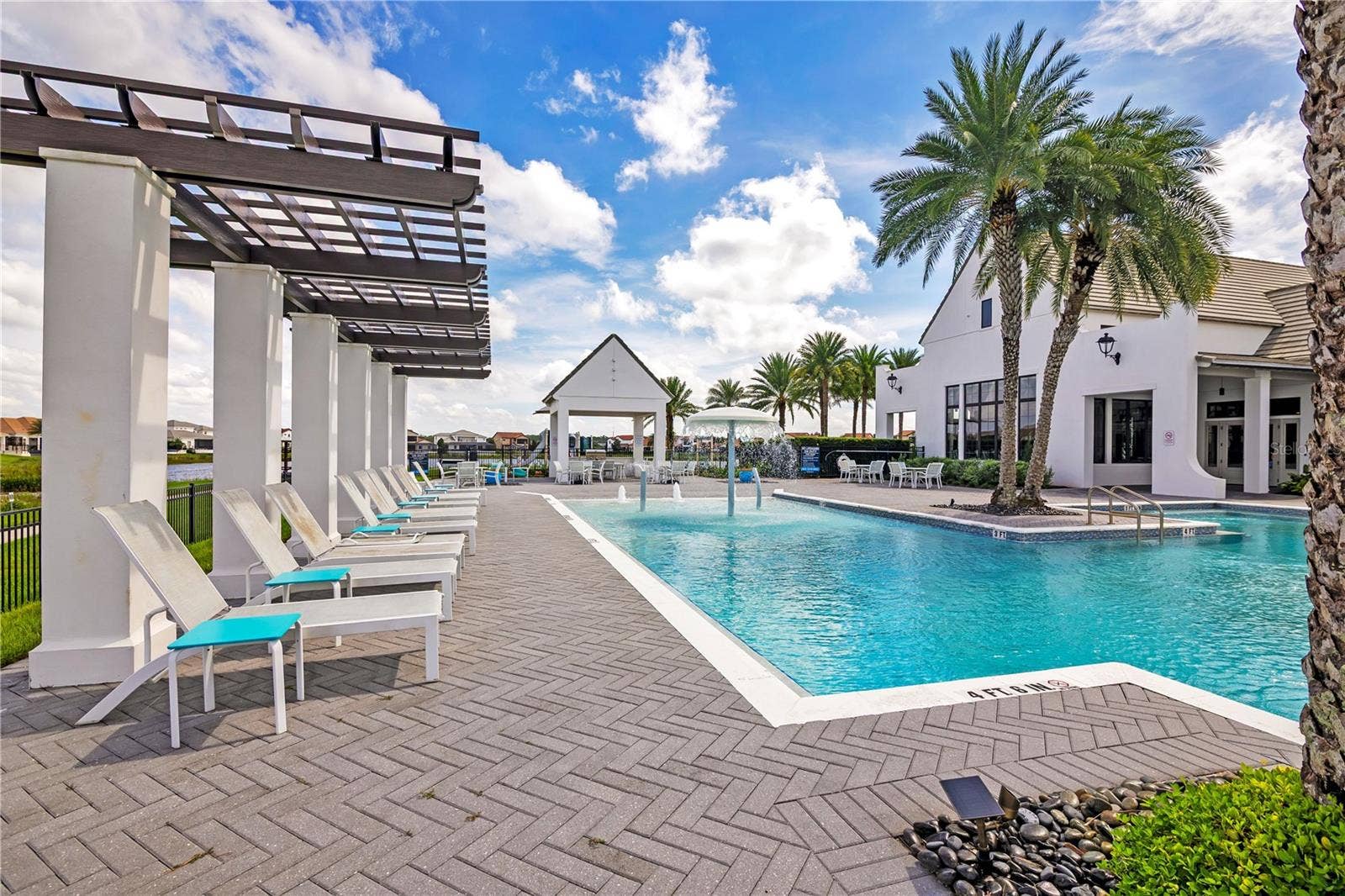 15749 CUTTER SAIL PLACE, Winter Garden, FL 34787 Enjoy the Florida sunshine from comfortable poolside seating and shaded relaxation areas.