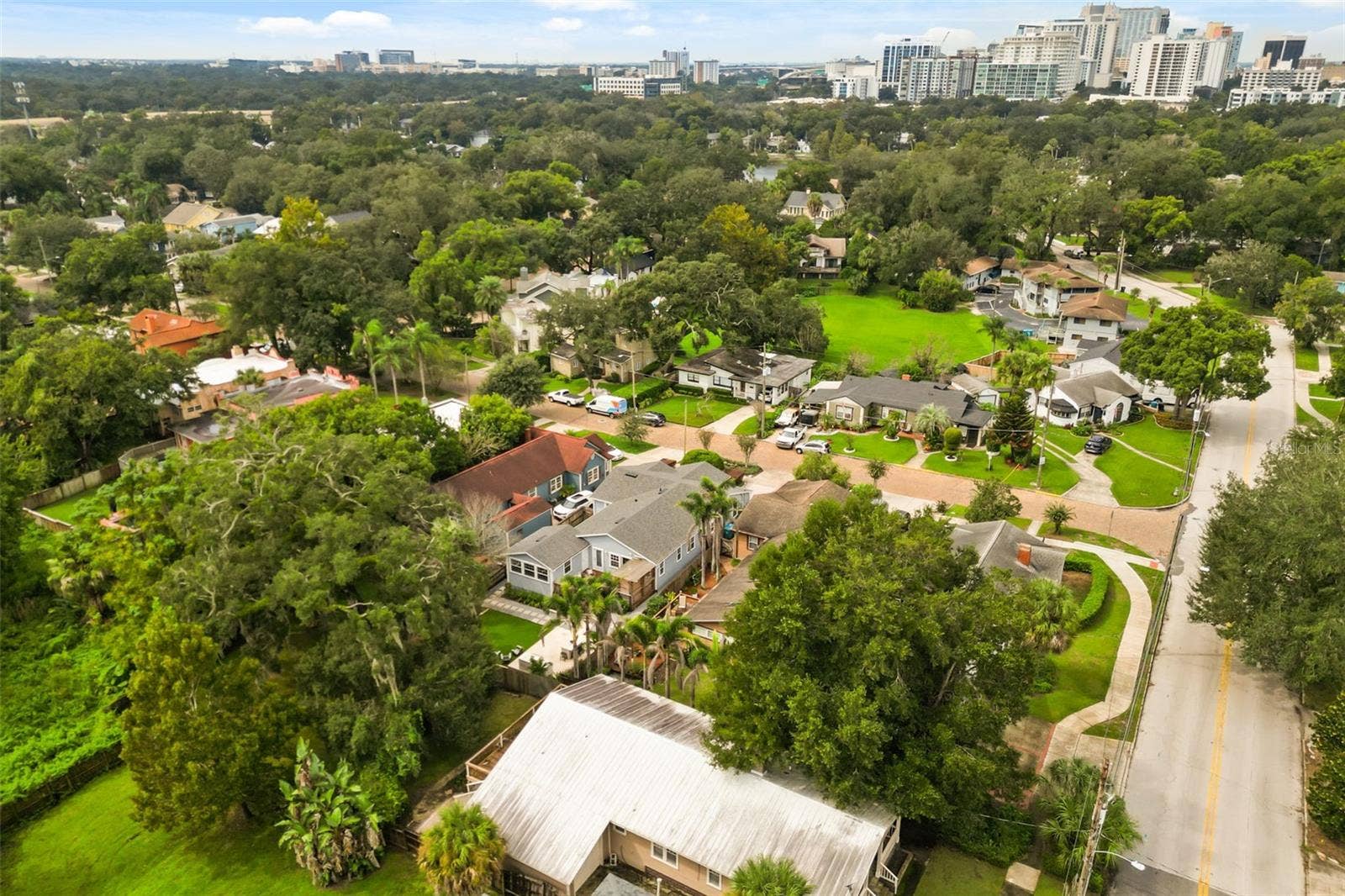 Aerial view of the home and street