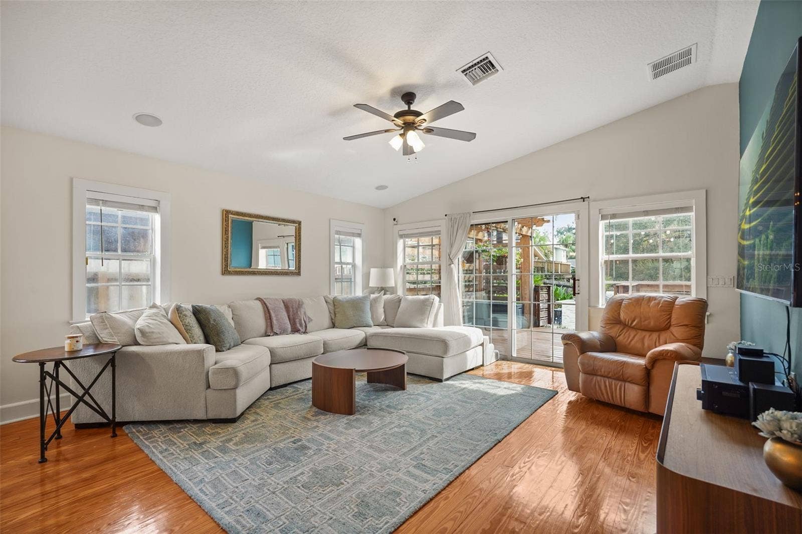 Living room with sliding glass doors to the rear deck