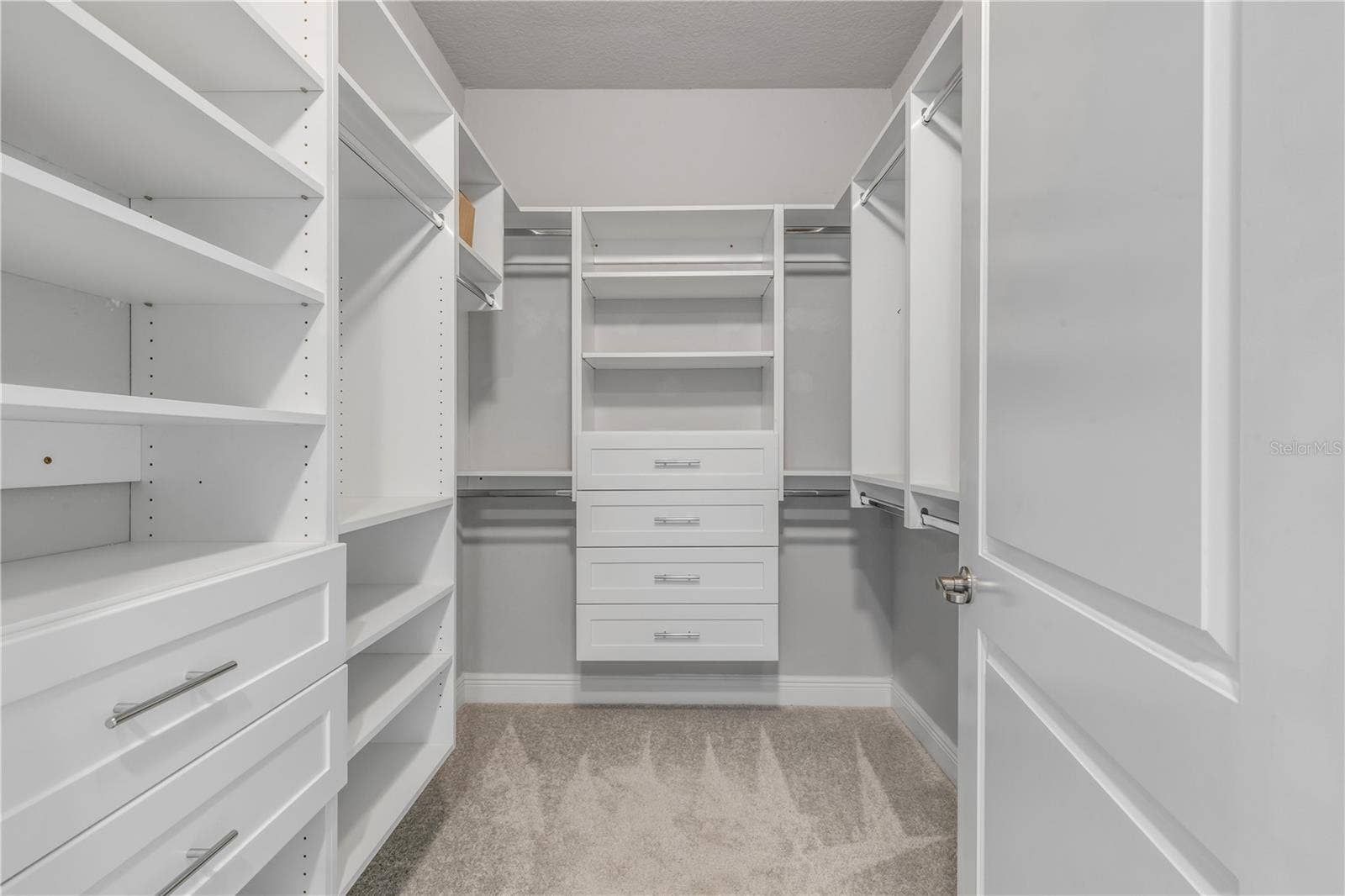 1 RIVERWALK DRIVE, #303, New Smyrna Beach, FL 32169 Primary bedroom walk in closet