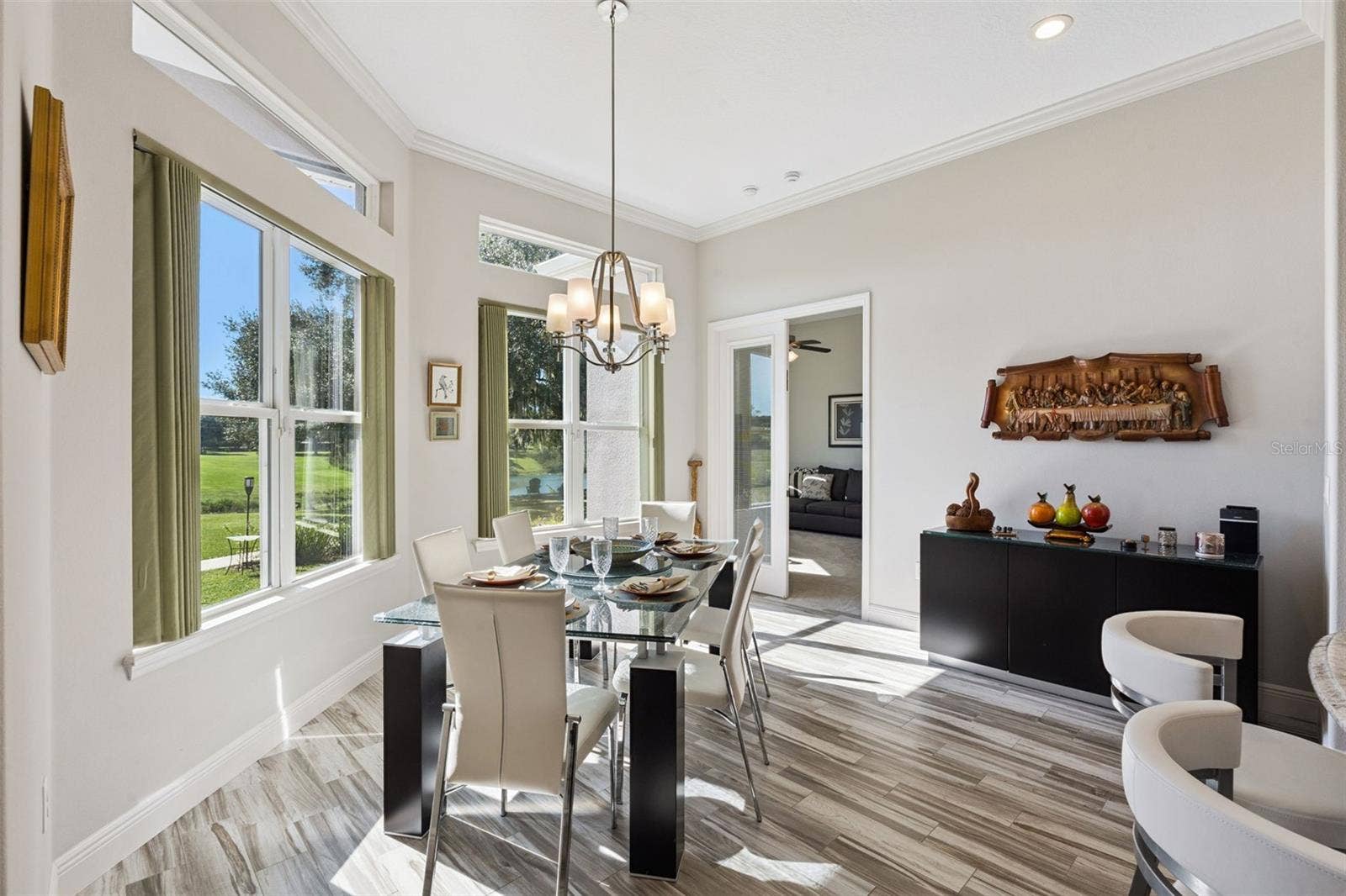36819 WOLF COURT, Eustis, FL 32736 Casual dining and french doors that lead to bedroom 4/In law suite