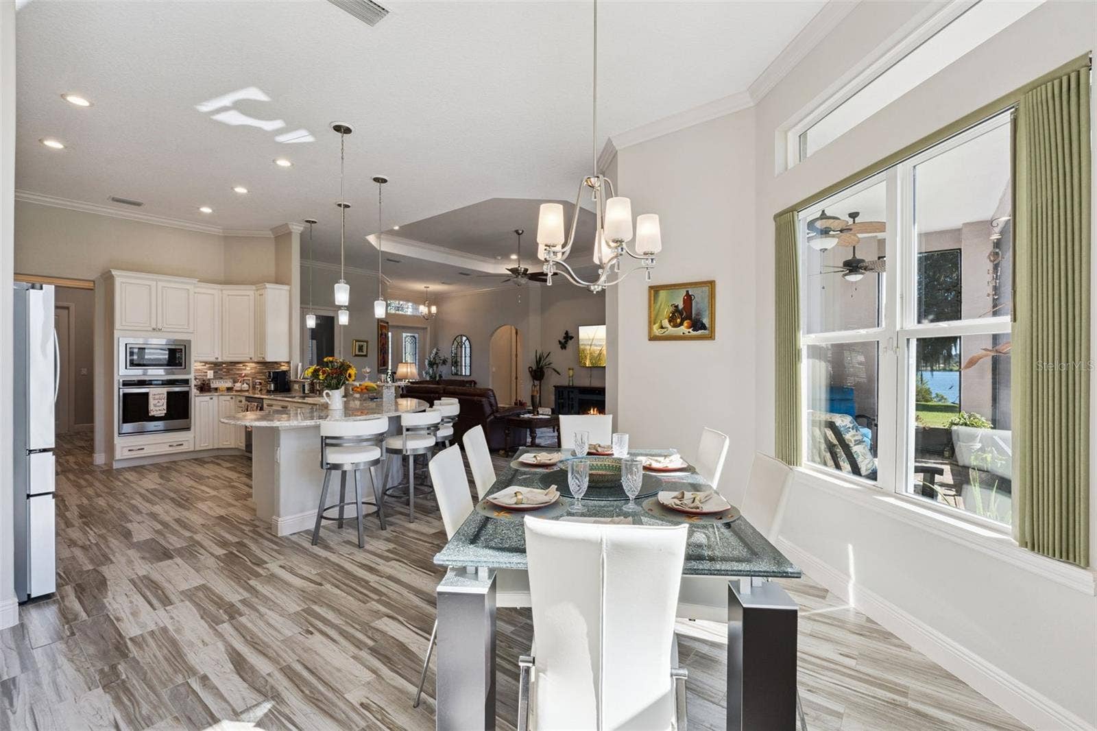 36819 WOLF COURT, Eustis, FL 32736 Casual dining area off the kitchen featuring scenic water views.