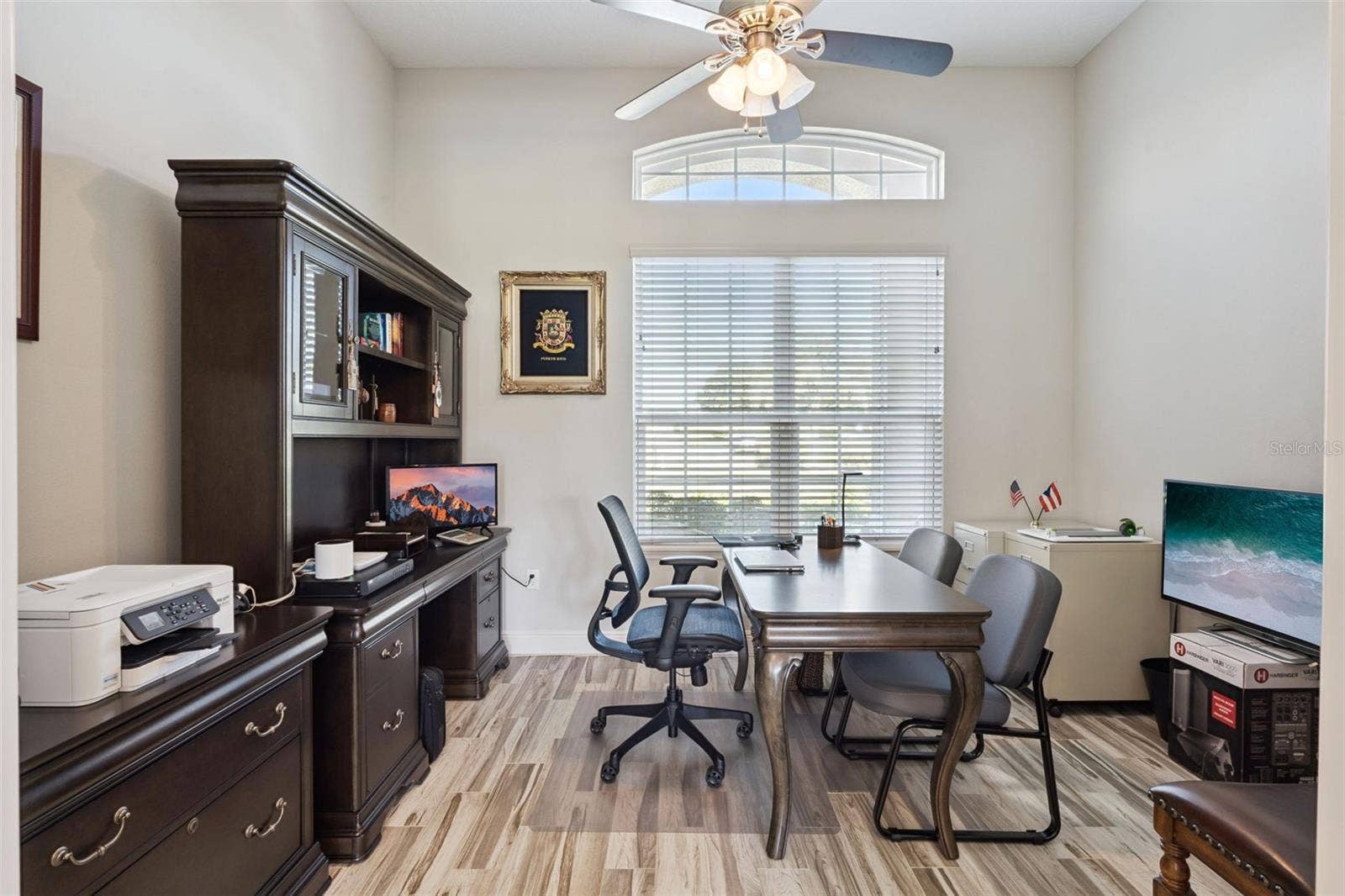 36819 WOLF COURT, Eustis, FL 32736 This home features a dedicated office space, providing the perfect environment for remote work and private professional meetings.