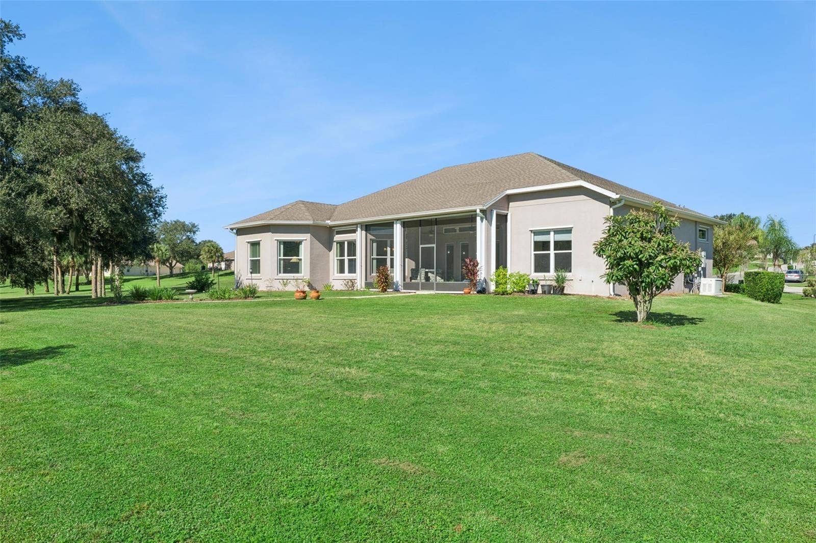 36819 WOLF COURT, Eustis, FL 32736 Over 1.6 gorgeous acres with multiple fruit trees including naval oranges, lemon tree, lemongrass, avocado, mangos, guava and olive