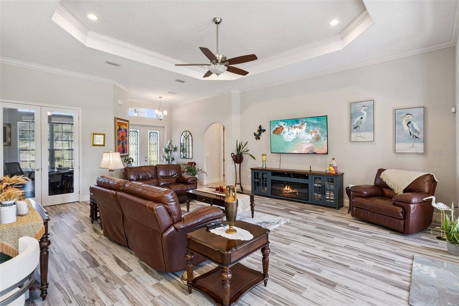 36819 WOLF COURT, Eustis, FL 32736 Trey ceiling in family room with view of french doors that lead to private office