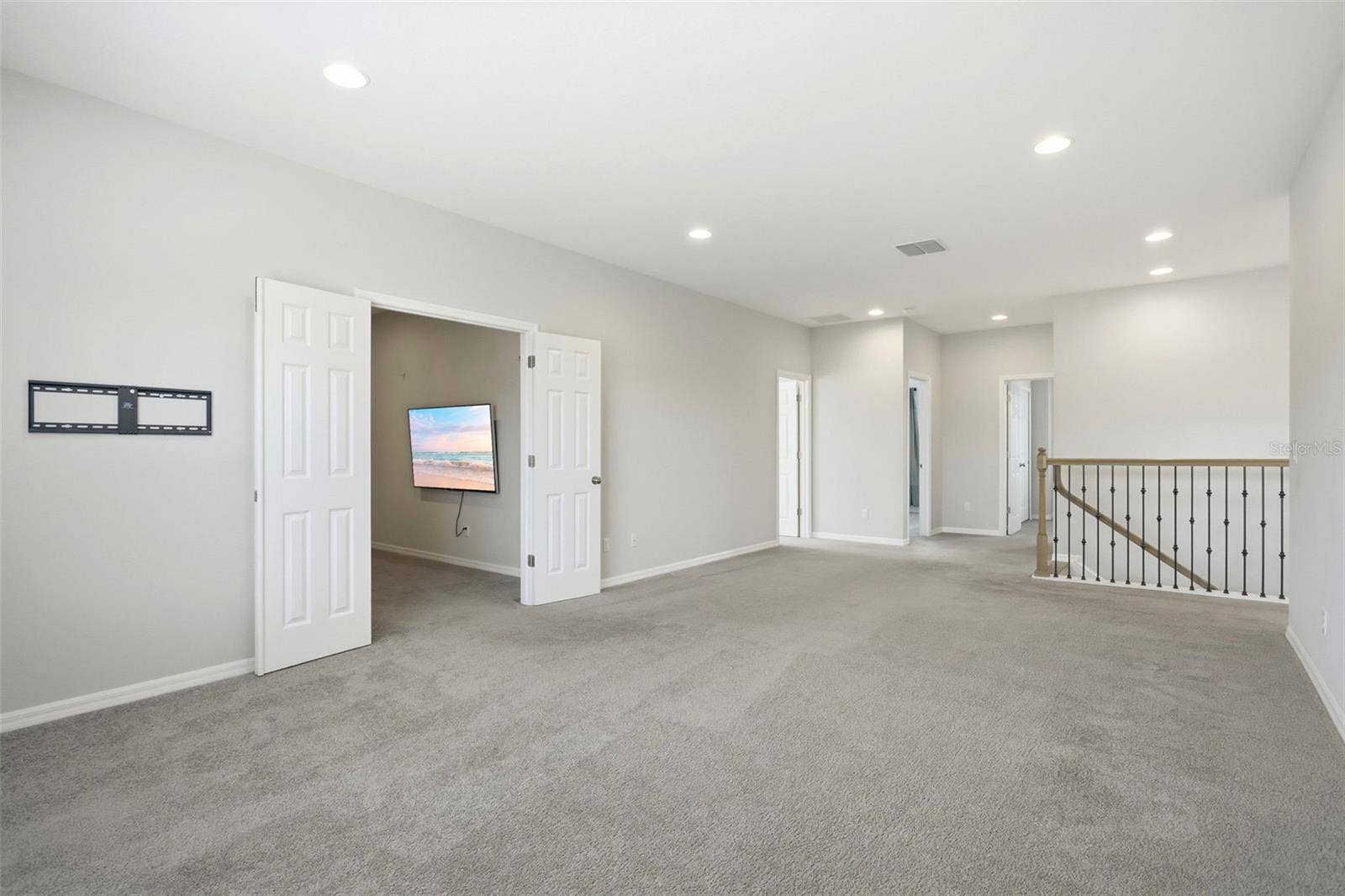 1552 MYRTLE OAKS TRAIL, Oviedo, FL 32765 Double door lead into the separate media room