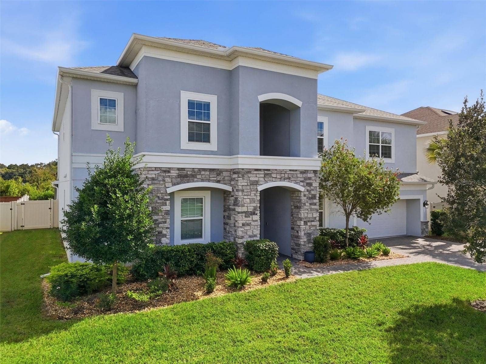 1552 MYRTLE OAKS TRAIL, Oviedo, FL 32765 Nicely manicured and landscaped makes for great curb appeal