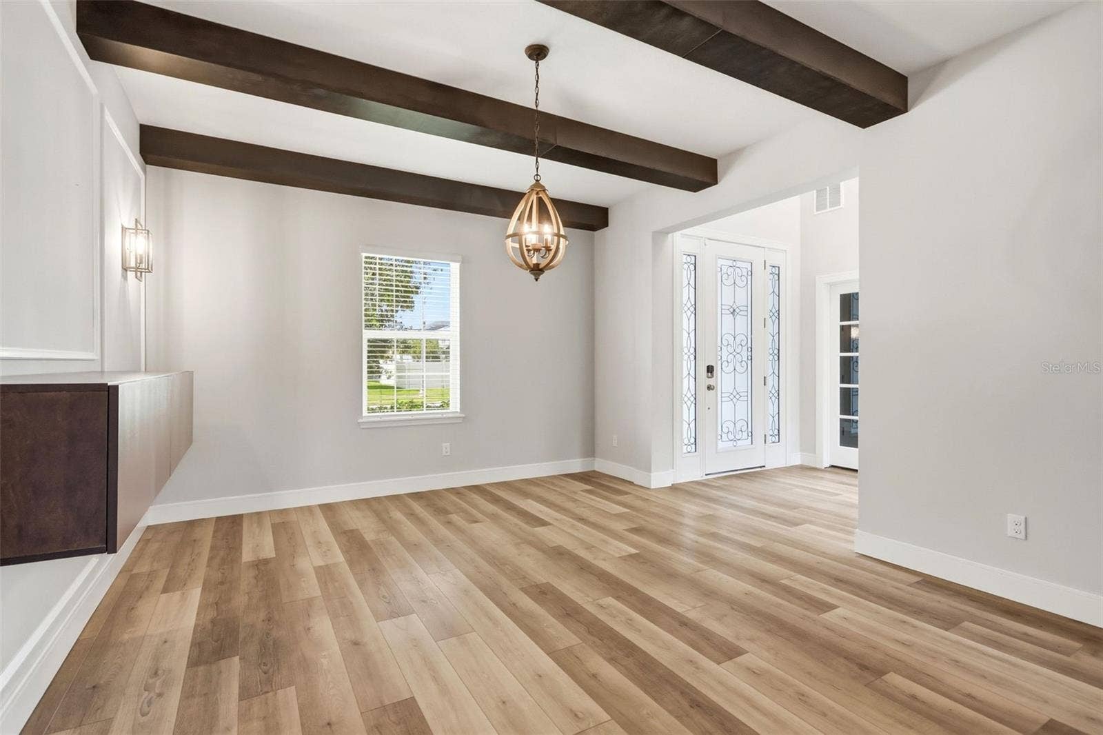 1552 MYRTLE OAKS TRAIL, Oviedo, FL 32765 Dining room at the entrance to the home