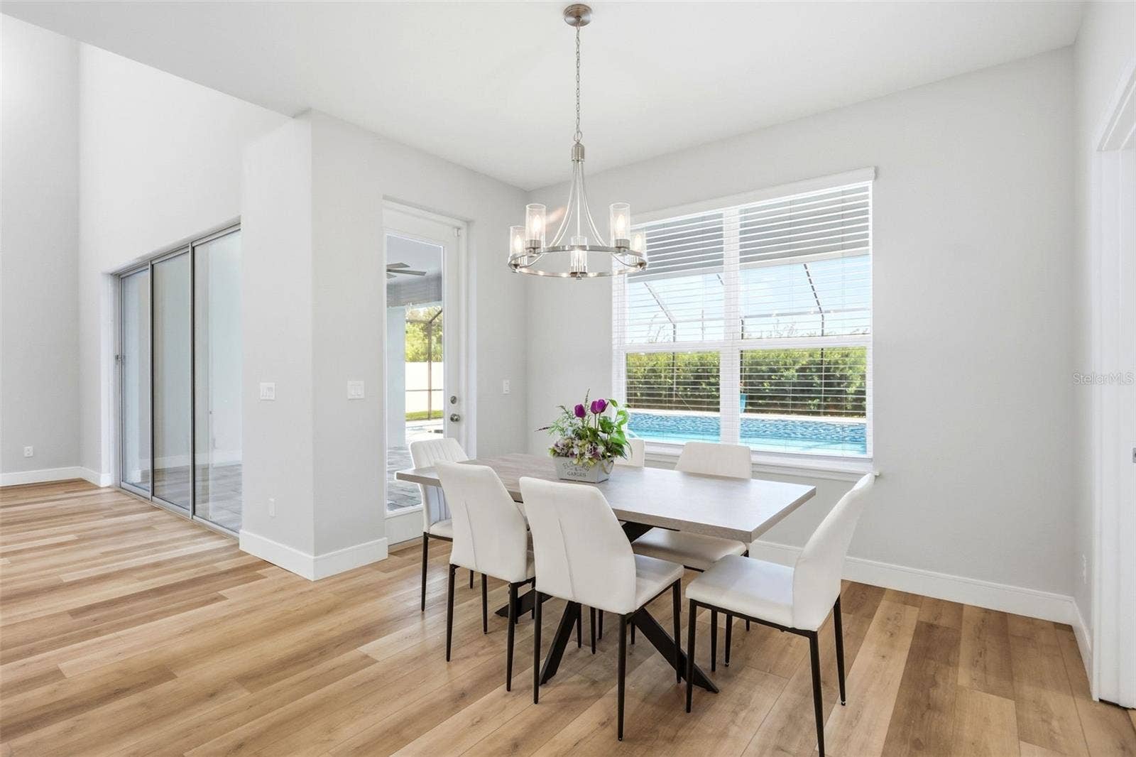 1552 MYRTLE OAKS TRAIL, Oviedo, FL 32765 Breakfast nook with great view of the pool and door leading out to the lanai