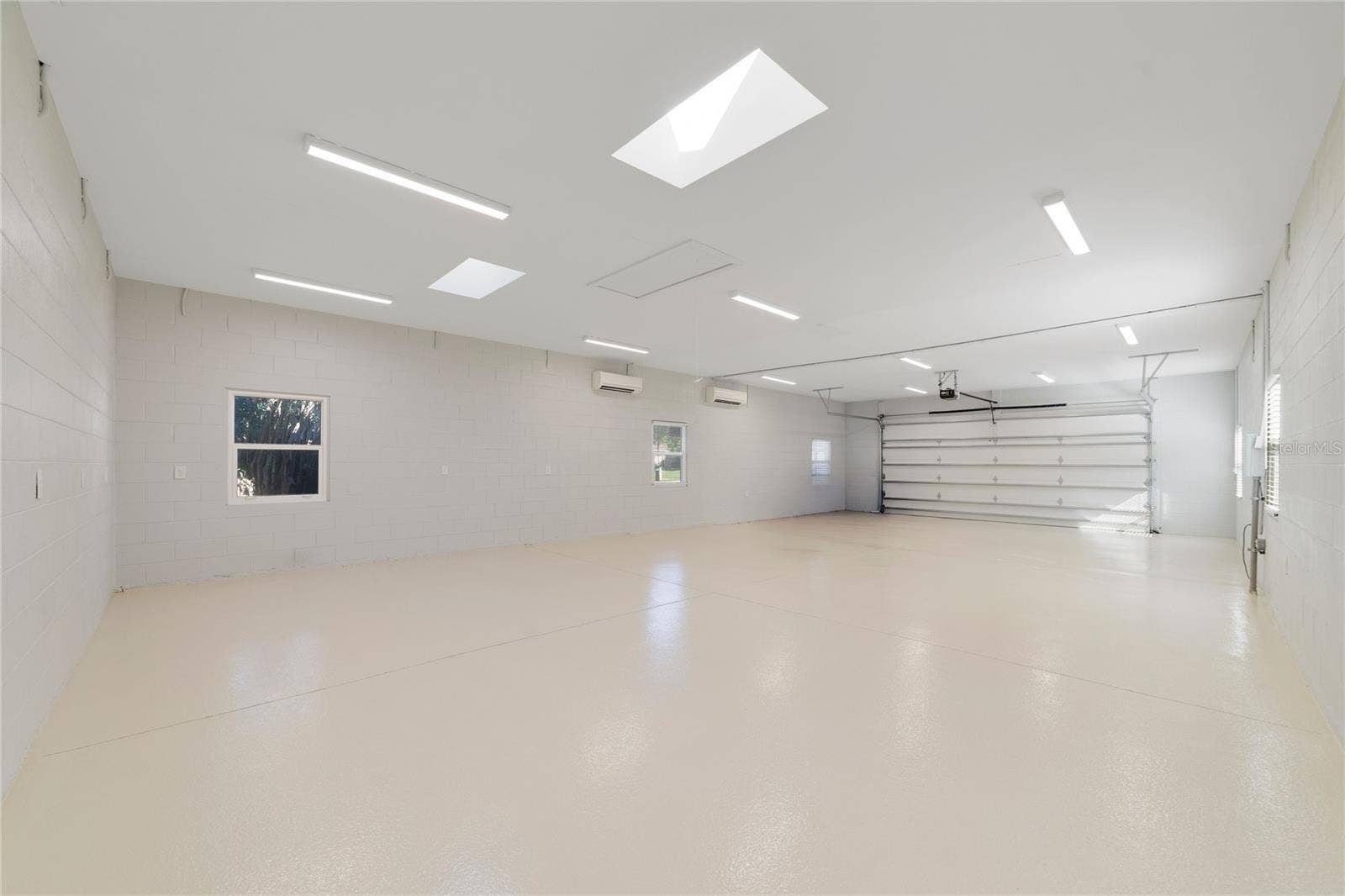 6 car garage/workshop/living space