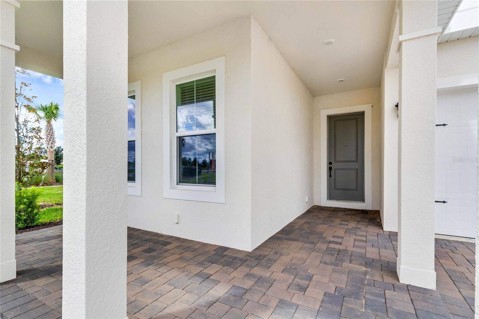 17590 JAPONICA BLOOM DRIVE, Winter Garden, FL 34787 Front porch (representative photo)