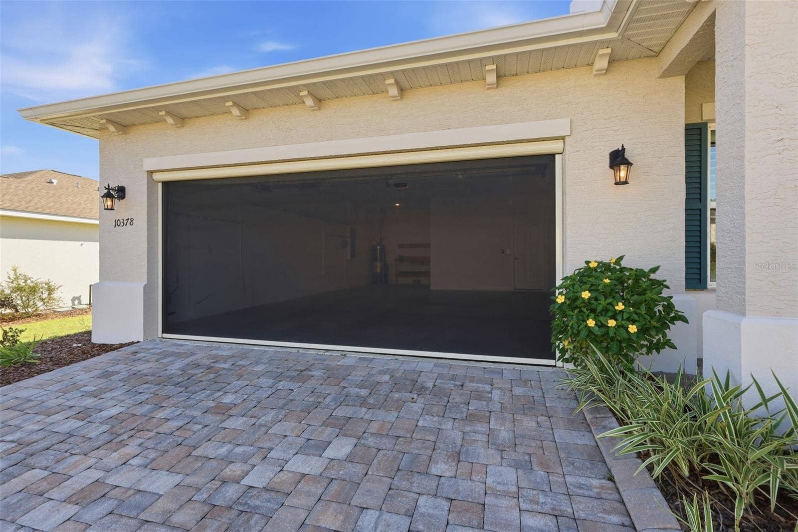 10378 SW 96TH LOOP, Ocala, FL 34481 Garage with Screen Door