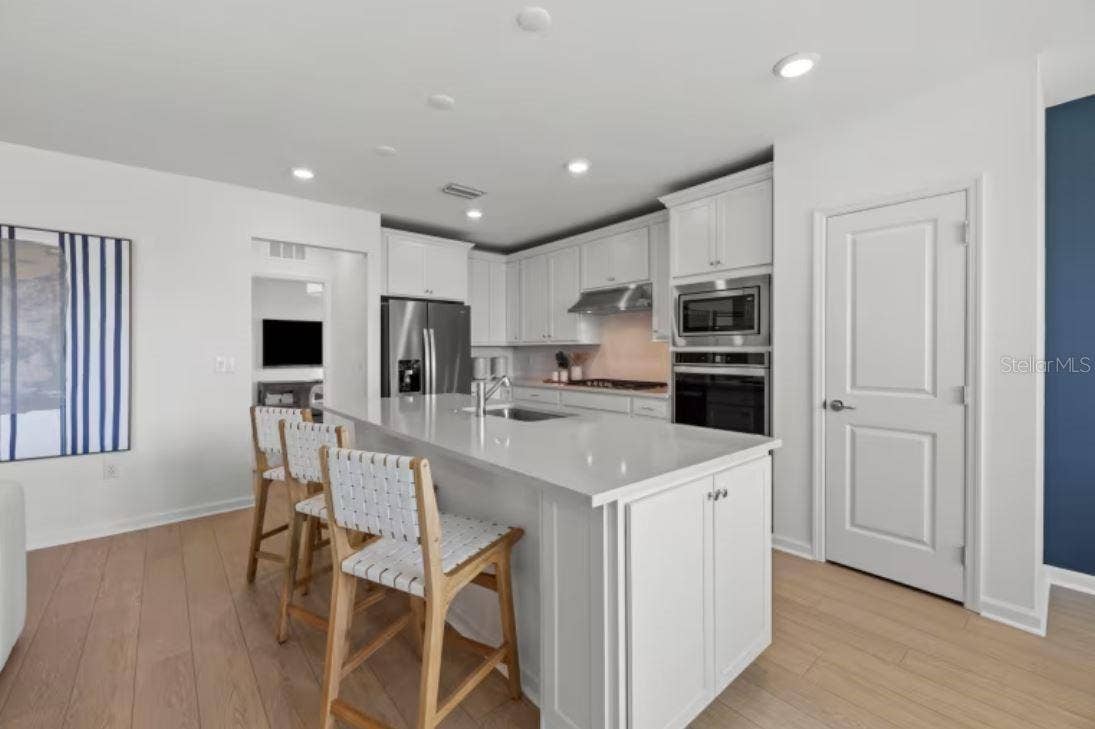 3911 MARBURY COURT, Davenport, FL 33837 Model Home Design Only. Pictures and furnishings are for illustrative purposes only. Elevations, colors and options may vary. Furniture is for model home staging only.