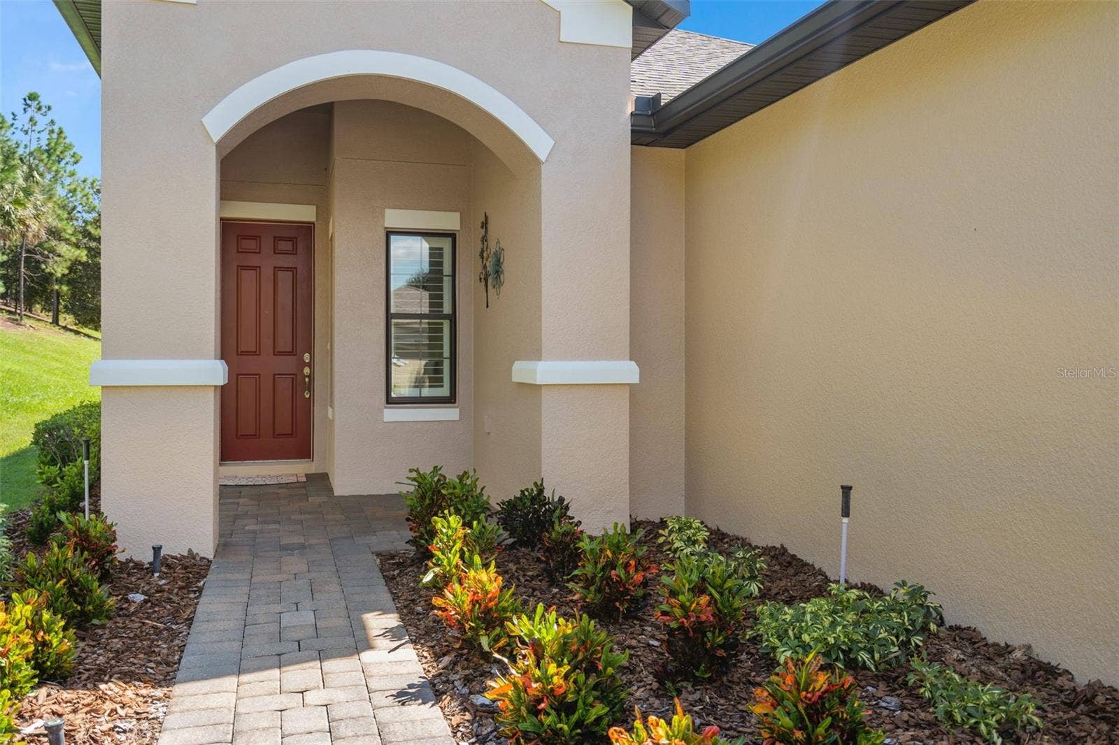 2607 CLEMSON RIDGE COURT, Clermont, FL 34715 Front Covered Entry