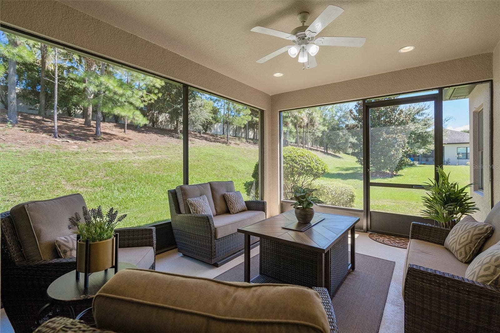 2607 CLEMSON RIDGE COURT, Clermont, FL 34715 Enjoy the Screened Lanai with a great backyard