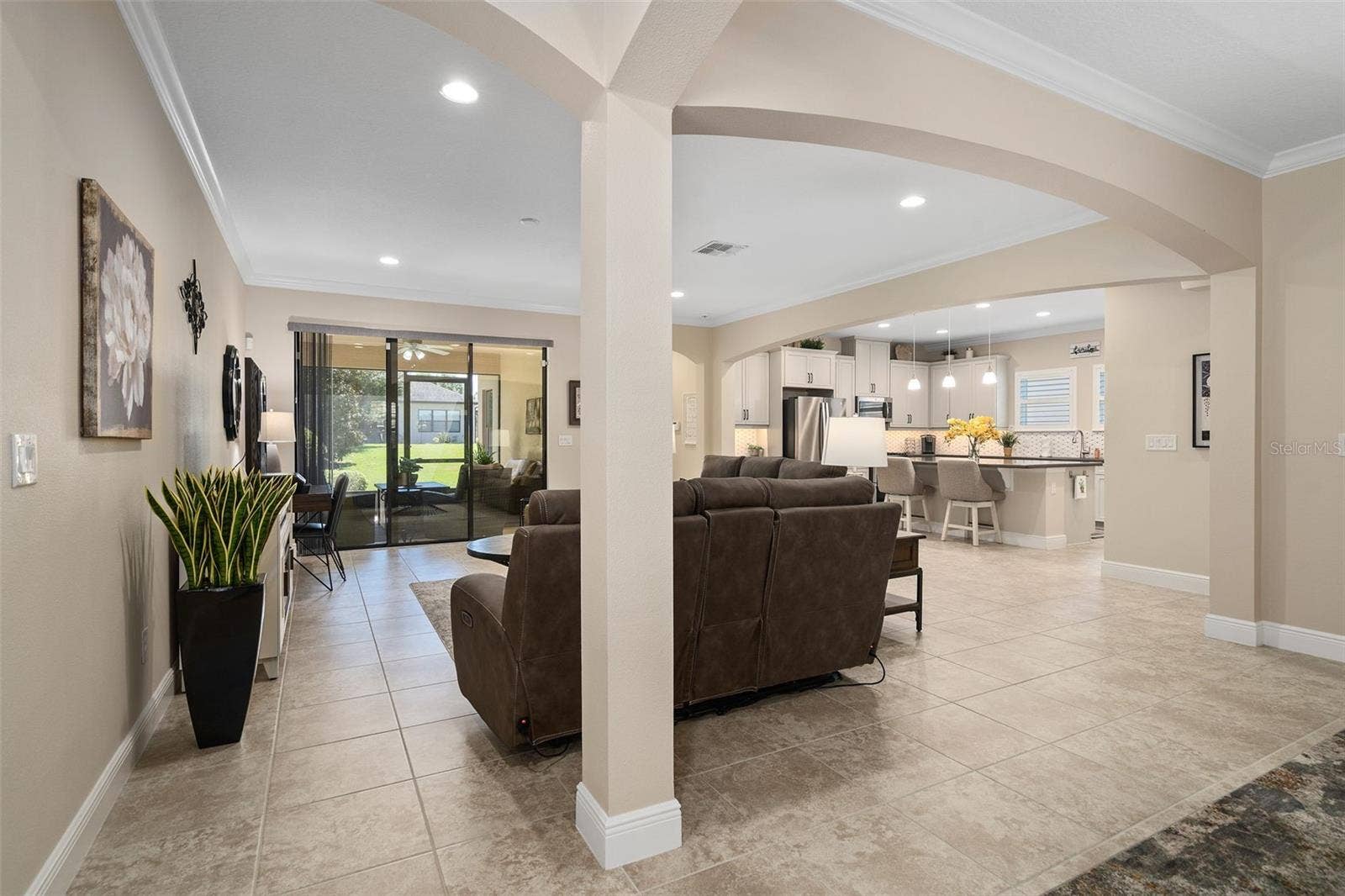 2607 CLEMSON RIDGE COURT, Clermont, FL 34715 Open and Flowing floor plan with 9'-4" Ceilings and Crown molding. This is a great area for entertaining.