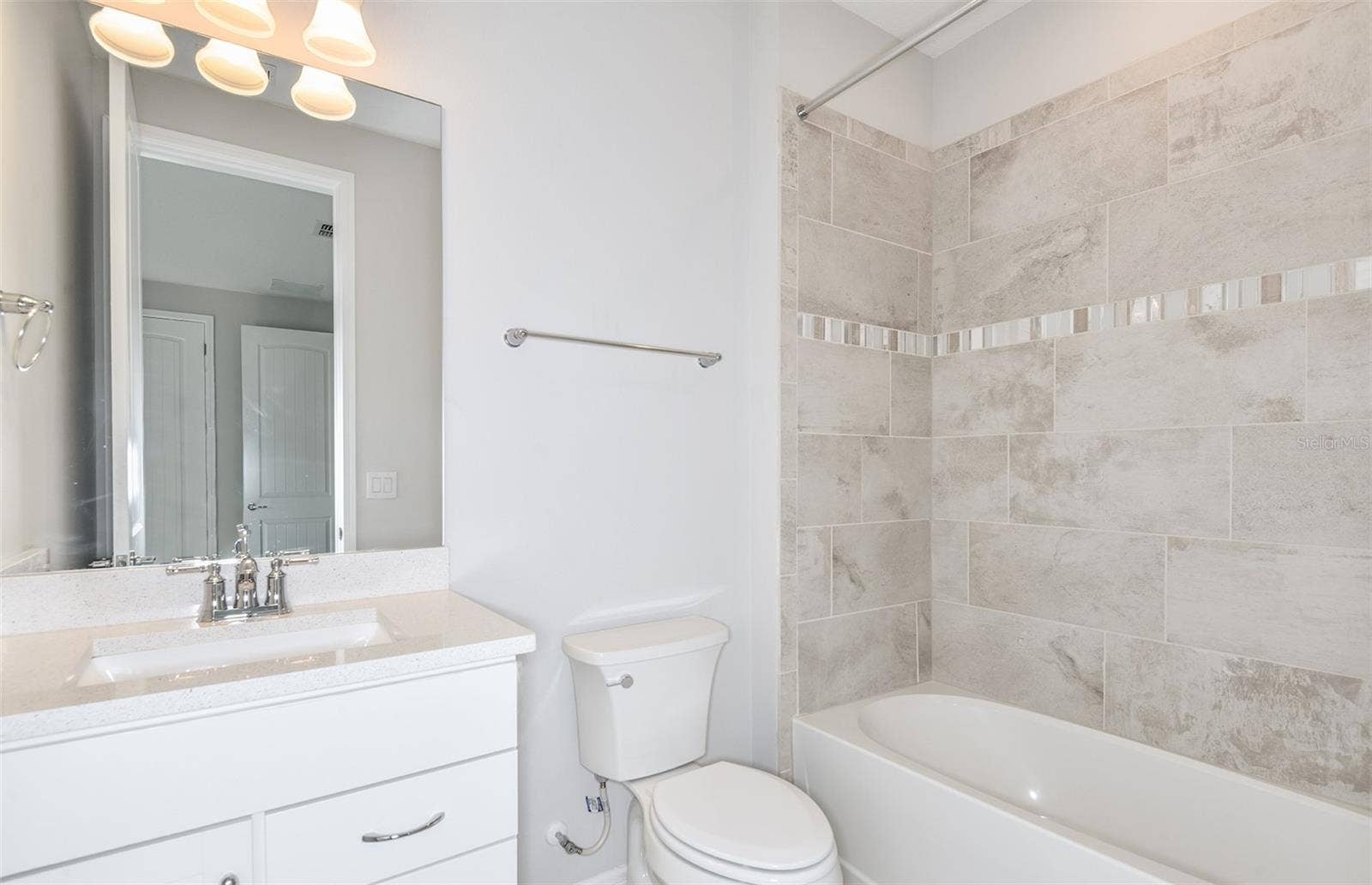 4833 FINLEY DRIVE, Davenport, FL 33837 Model Home Design Only. Pictures and furnishings are for illustrative purposes only. Elevations, colors and options may vary. Furniture is for model home staging only.