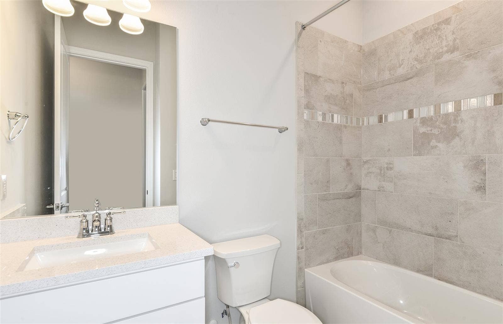 4833 FINLEY DRIVE, Davenport, FL 33837 Model Home Design Only. Pictures and furnishings are for illustrative purposes only. Elevations, colors and options may vary. Furniture is for model home staging only.