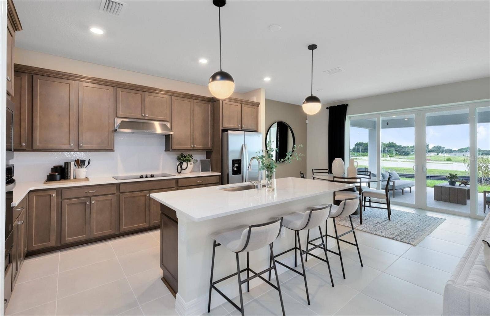 3451 HAVEN SIDE ROAD, Davenport, FL 33837 Model Home Design Only. Pictures and furnishings are for illustrative purposes only. Elevations, colors and options may vary. Furniture is for model home staging only.