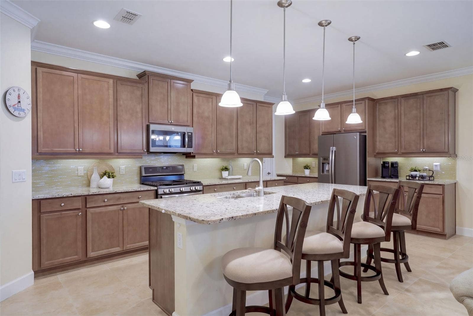 1233 EGGLESTON DRIVE, Deland, FL 32724 19' x 10' Kitchen w/ 42" cabinets, under cabinet lighting, Listello backsplash & granite countertops