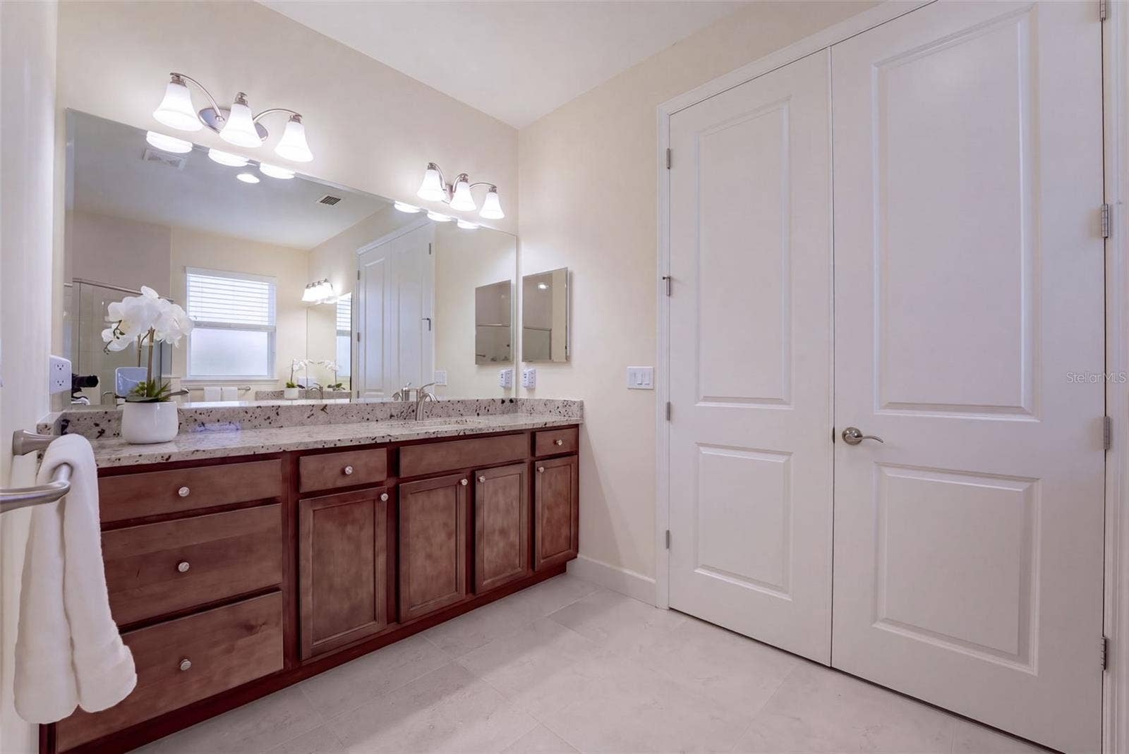 1233 EGGLESTON DRIVE, Deland, FL 32724 Primary Bathroom w/ double door entry into Bedroom