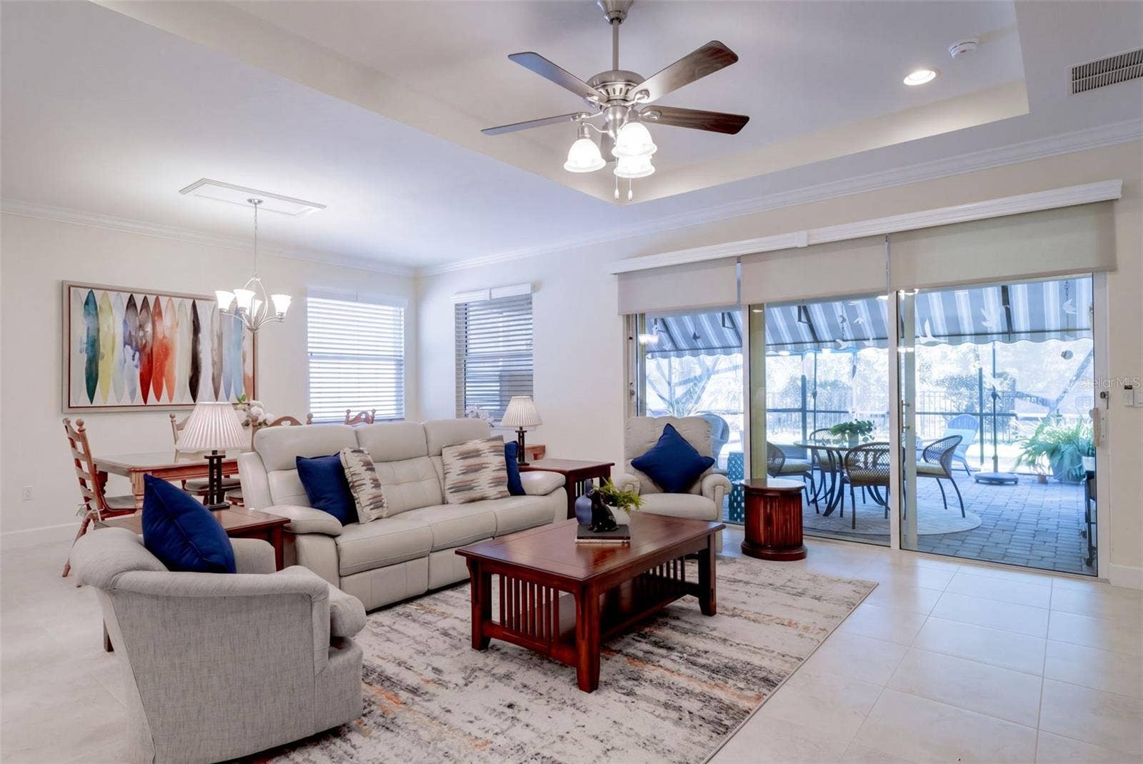 1233 EGGLESTON DRIVE, Deland, FL 32724 View of the Great Room, Dining Room & expanded screen enclosed covered Lanai