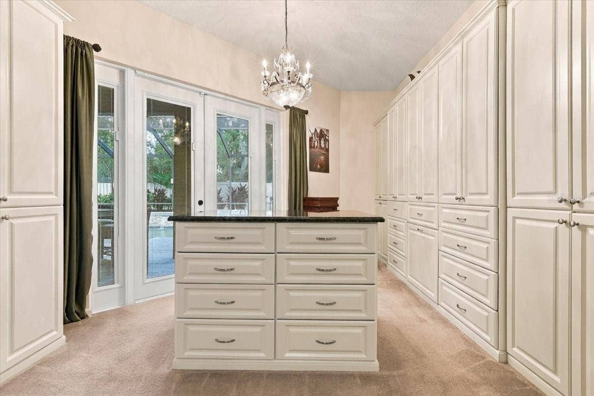 One of three walk-in closets!