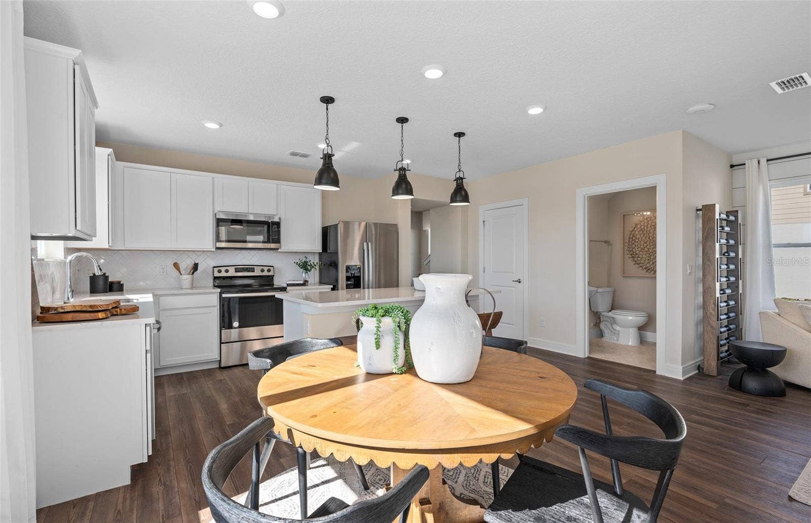 2628 CLEAR NIGHT AVENUE, Kissimmee, FL 34744 Model Home Design Only. Pictures and furnishings are for illustrative purposes only. Elevations, colors and options may vary. Furniture is for model home staging only.