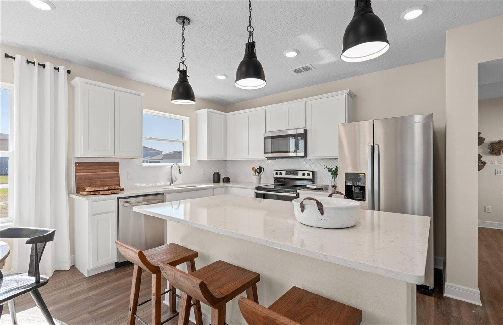 2628 CLEAR NIGHT AVENUE, Kissimmee, FL 34744 Model Home Design Only. Pictures and furnishings are for illustrative purposes only. Elevations, colors and options may vary. Furniture is for model home staging only.