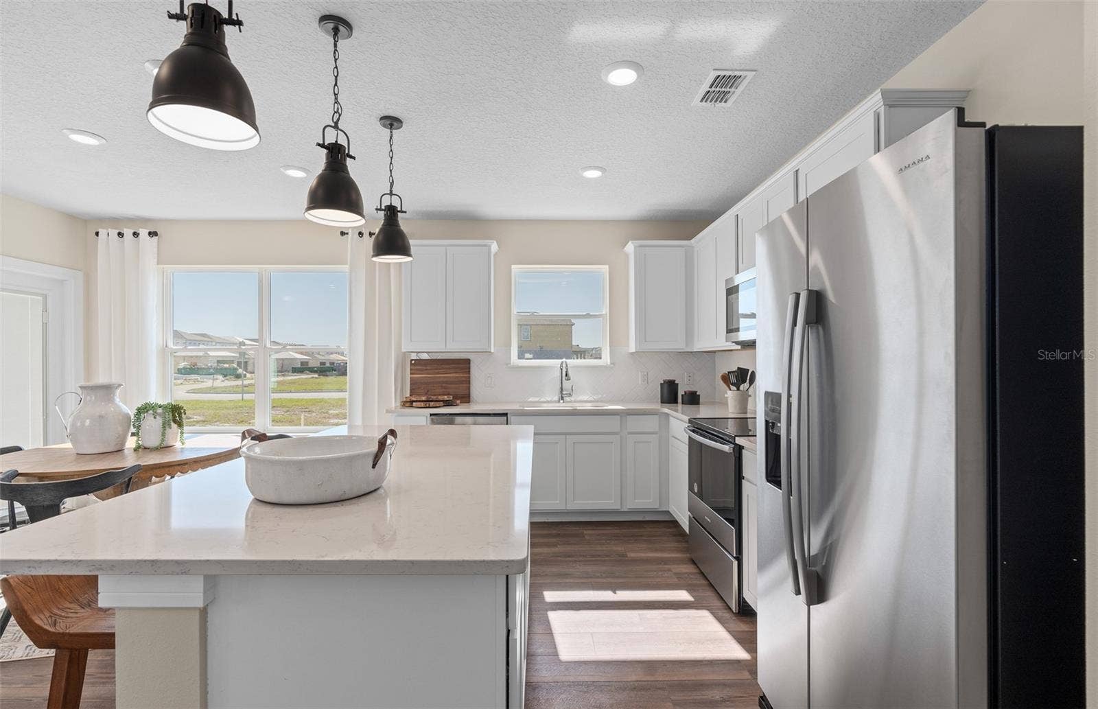 2628 CLEAR NIGHT AVENUE, Kissimmee, FL 34744 Model Home Design Only. Pictures and furnishings are for illustrative purposes only. Elevations, colors and options may vary. Furniture is for model home staging only.