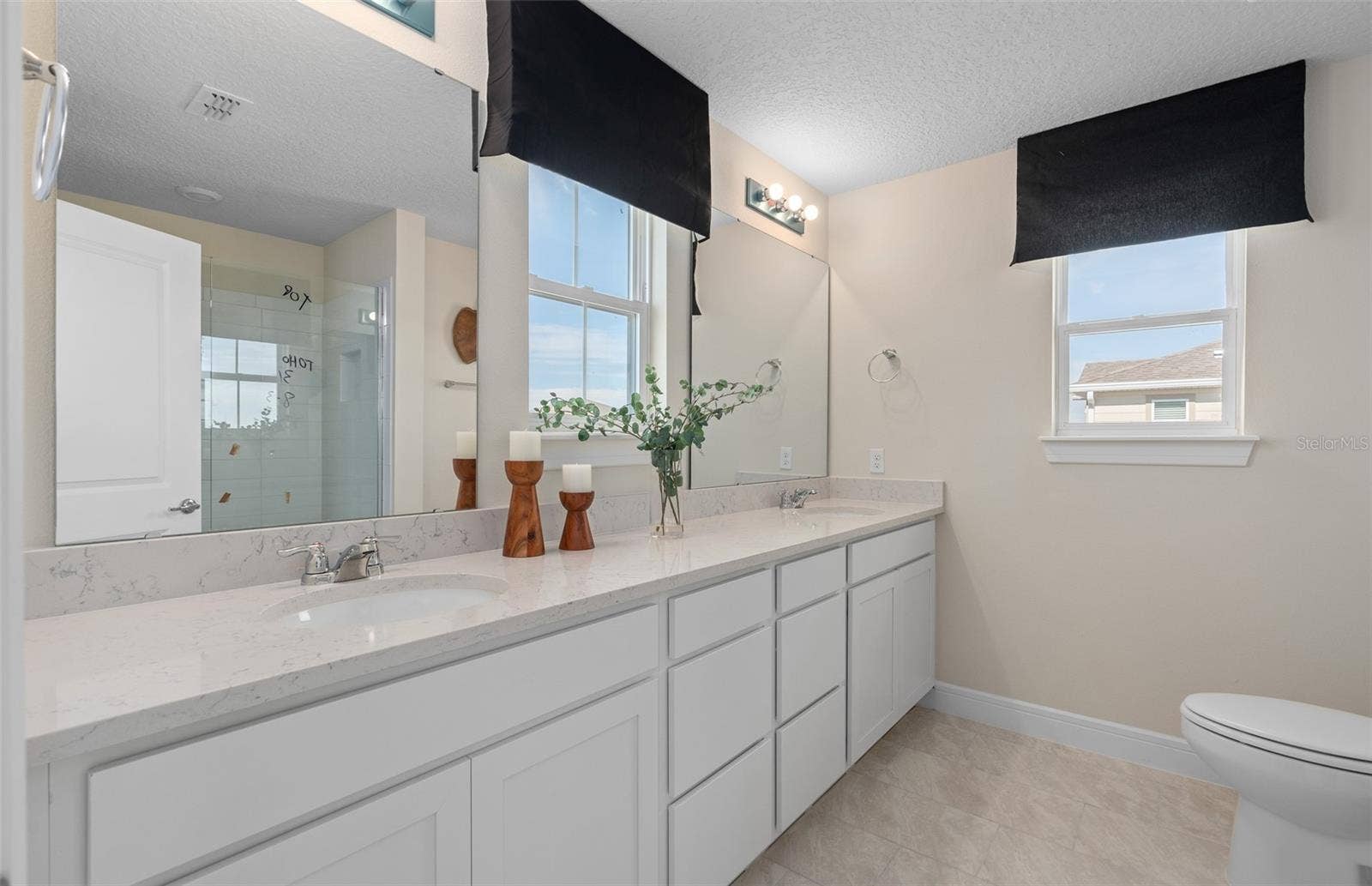 2628 CLEAR NIGHT AVENUE, Kissimmee, FL 34744 Model Home Design Only. Pictures and furnishings are for illustrative purposes only. Elevations, colors and options may vary. Furniture is for model home staging only.