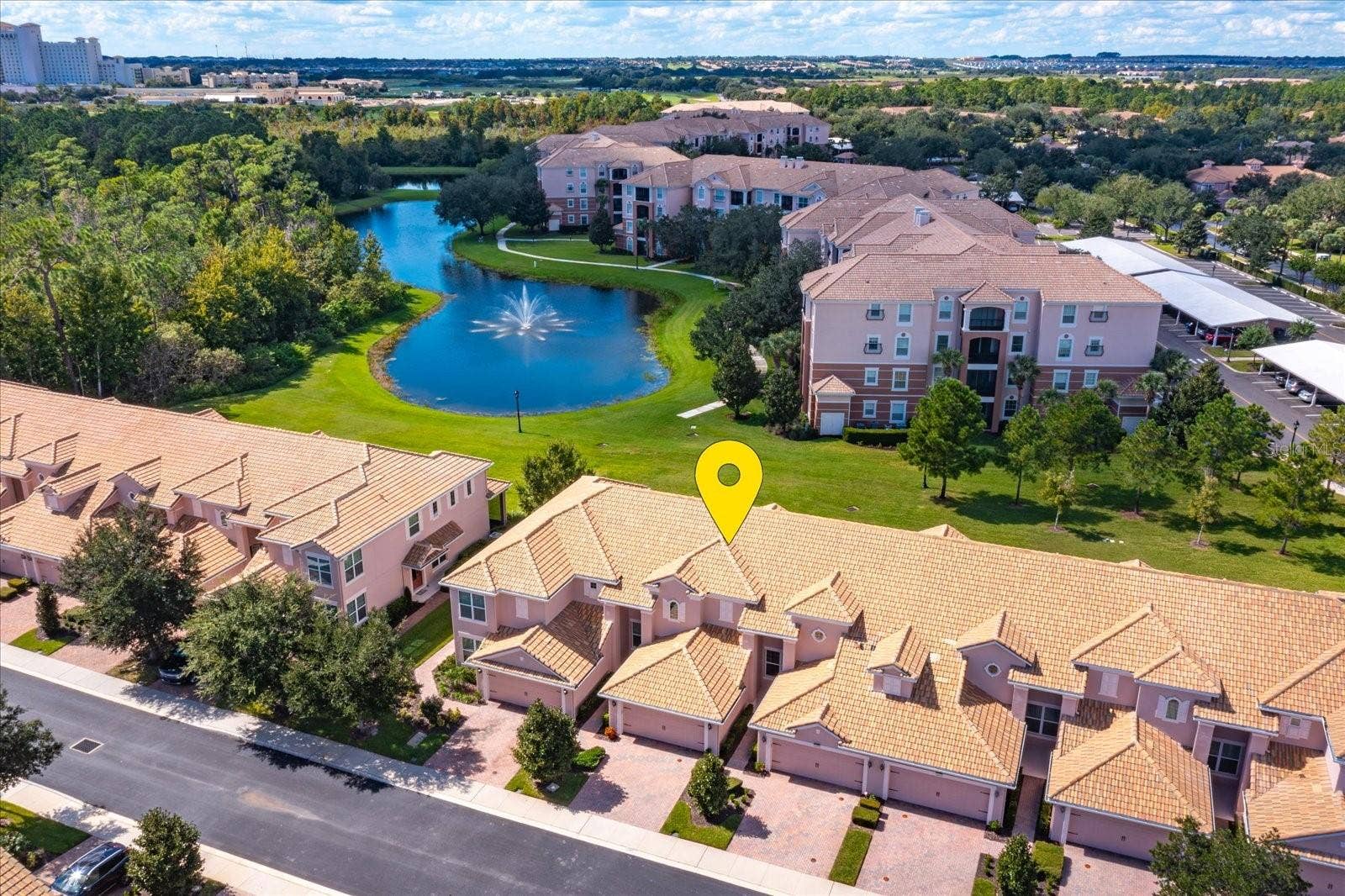 1454 EL CONTE DR, Champions Gate, FL 33896 Aerial with pond & fountain