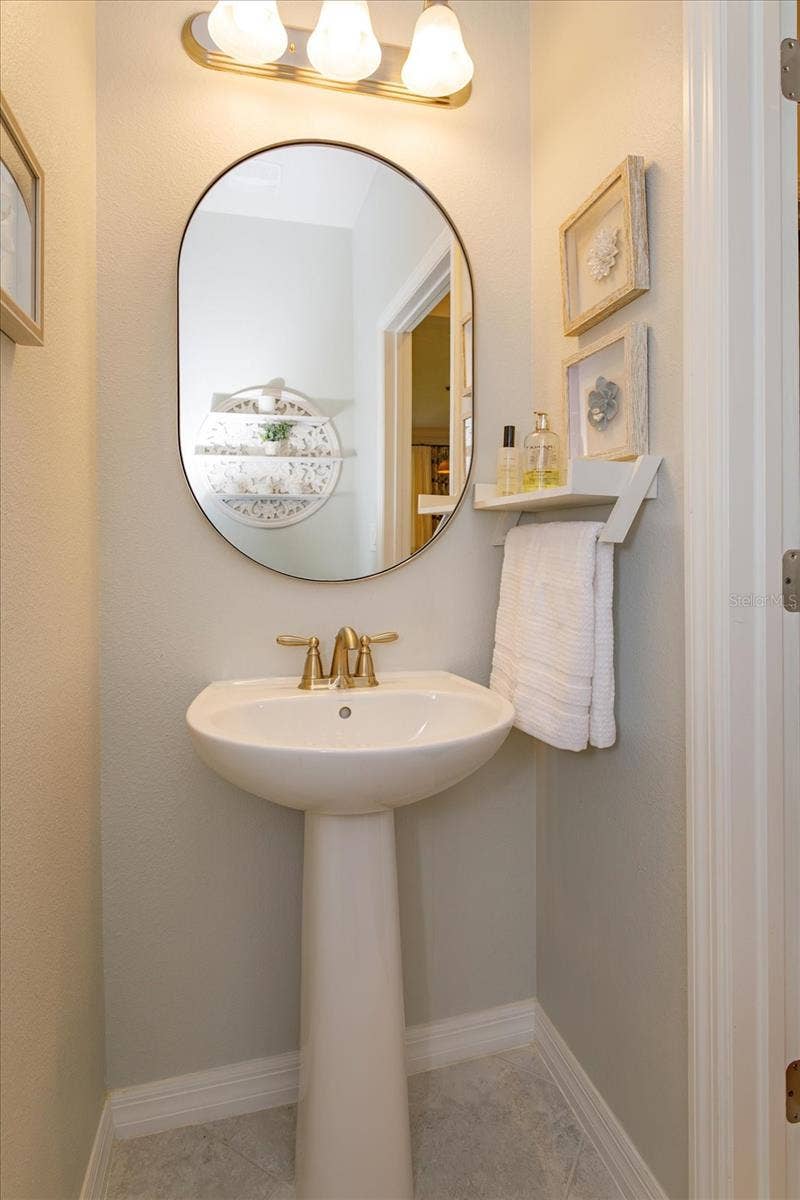 1454 EL CONTE DR, Champions Gate, FL 33896 Downstairs half bathroom