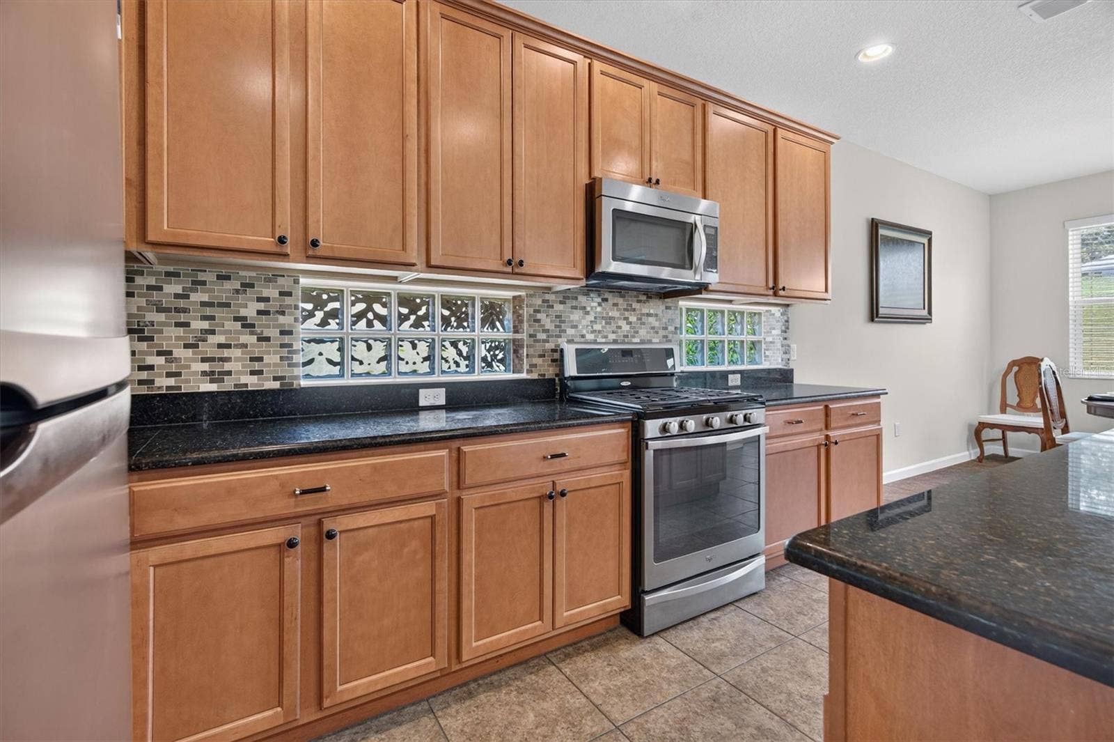 2315 NATOMA BOULEVARD, Mount Dora, FL 32757 Kitchen with granite countertops