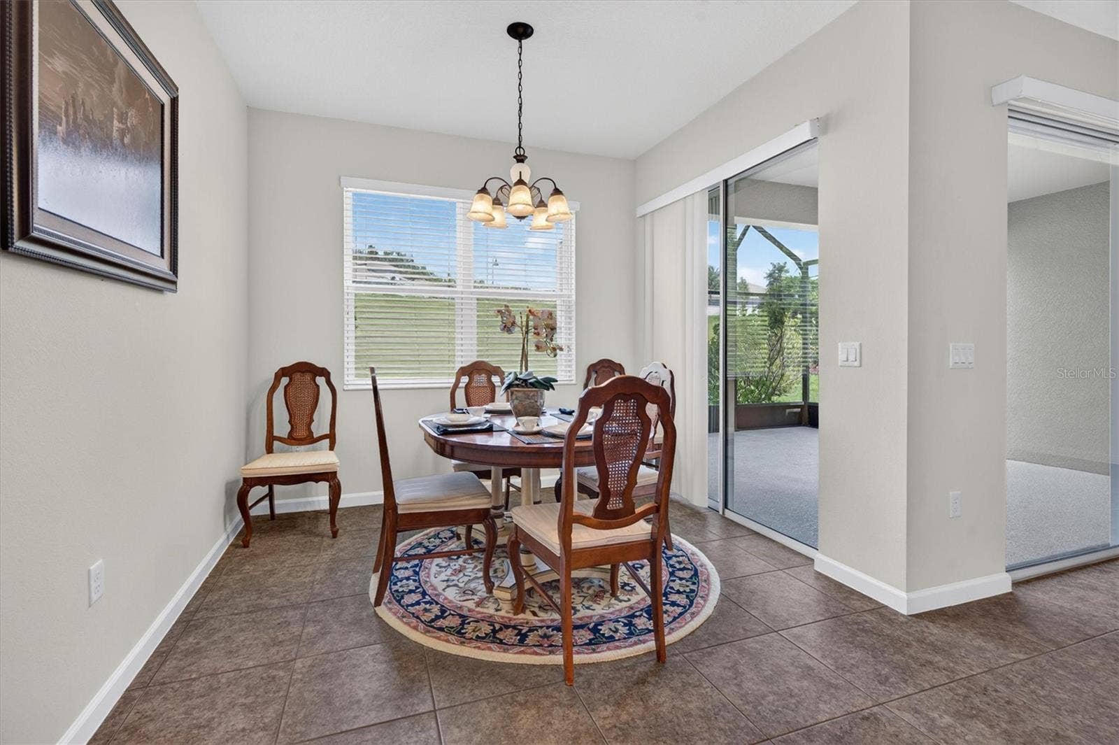 2315 NATOMA BOULEVARD, Mount Dora, FL 32757 Breakfast room with patio access