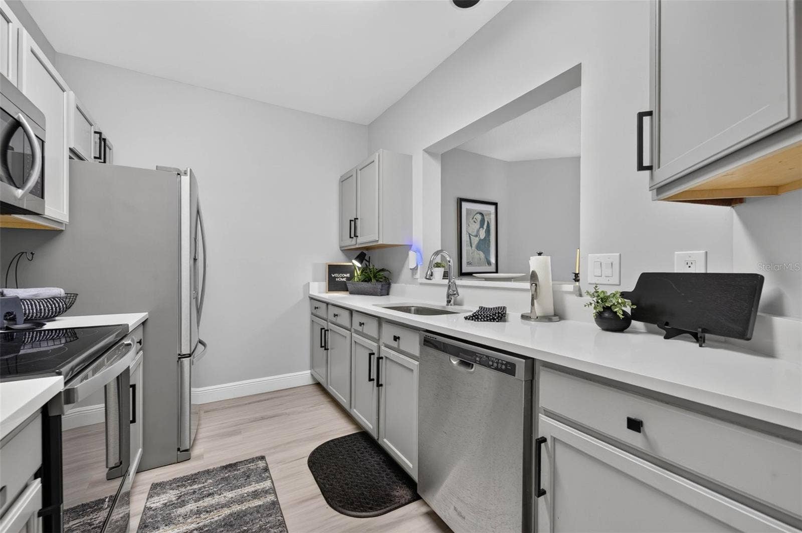 Kitchen counters, sink and dishwasher