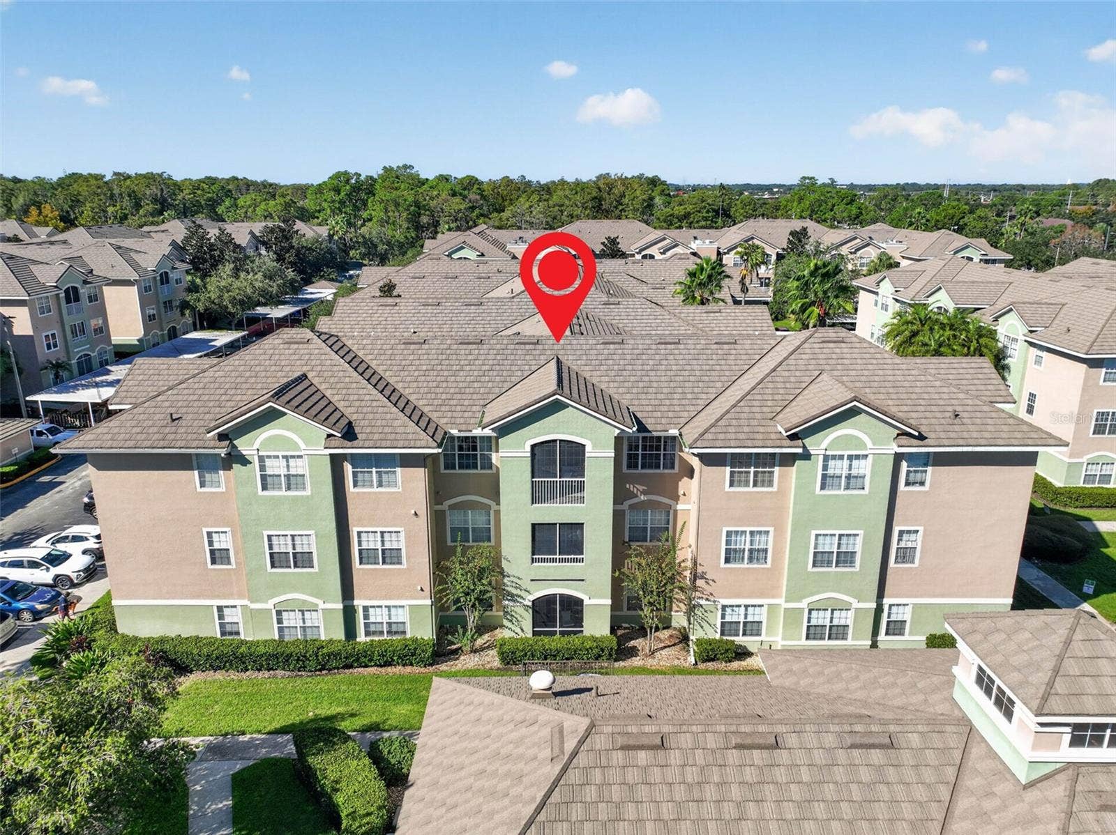 Aerial front view with location pin on building 4849