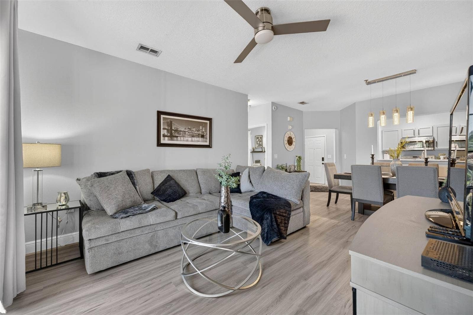 Living room looking toward dining area and kitchen