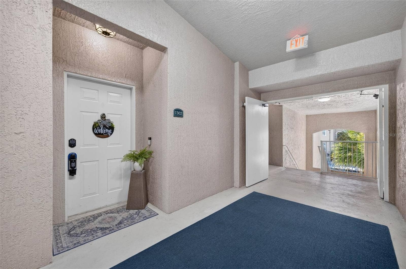 Front door and covered entry hallway