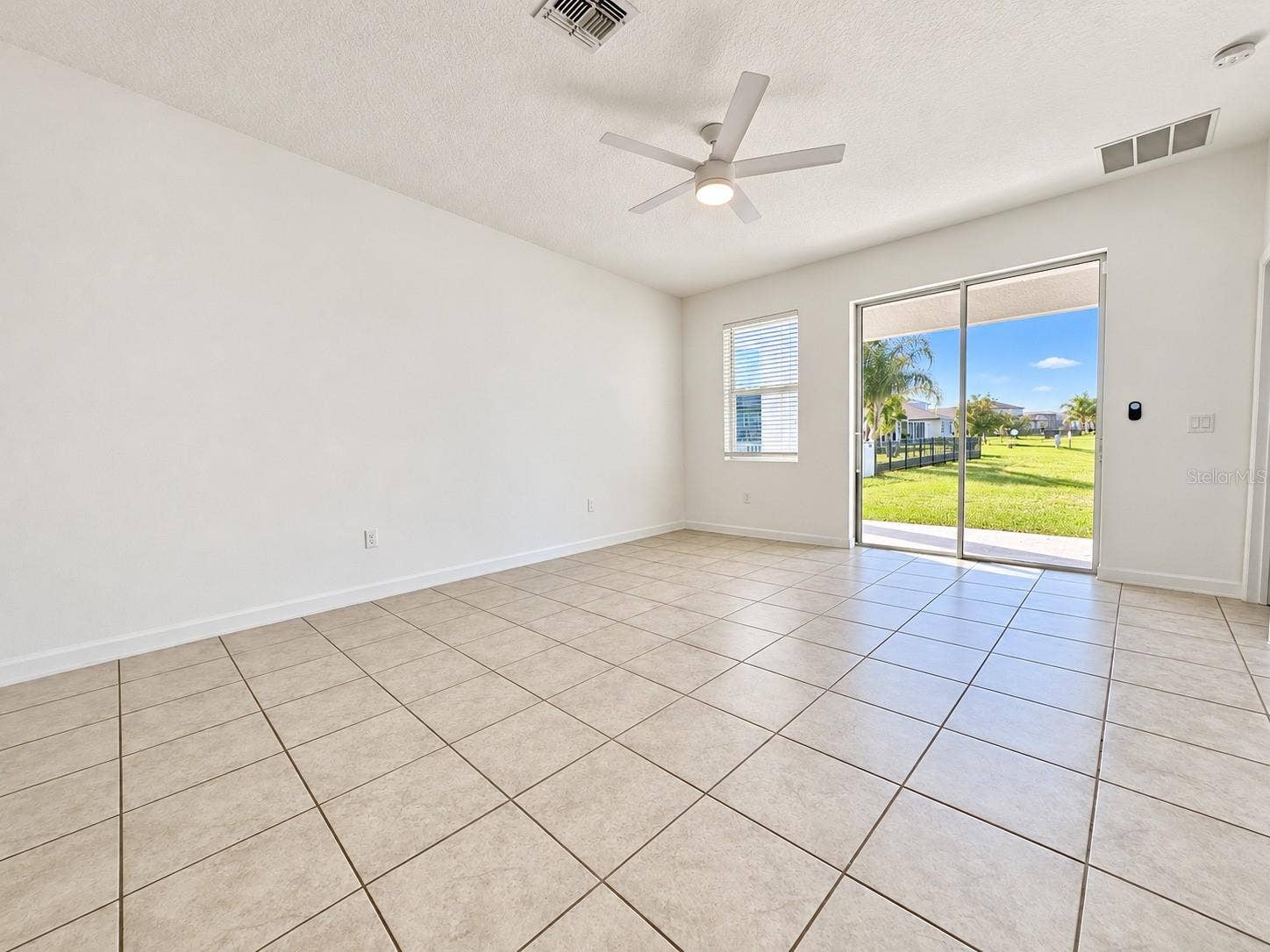 3106 CRAB TRAP DRIVE, New Smyrna Beach, FL 32168 Living & dining room