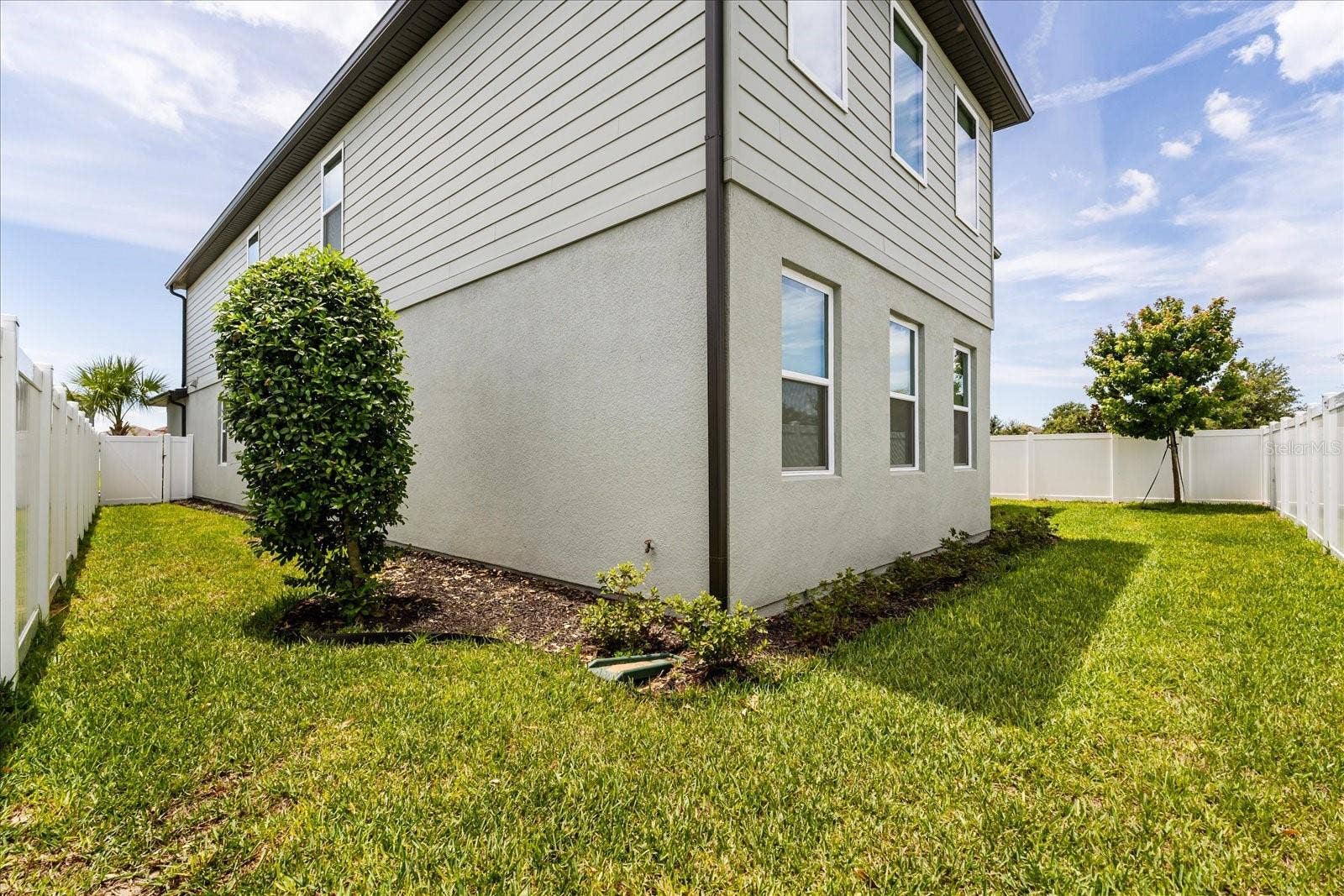 FENCED BACK YARD