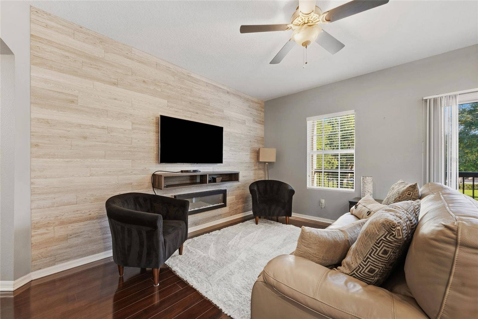 Beautiful accent wall featuring electric fireplace
